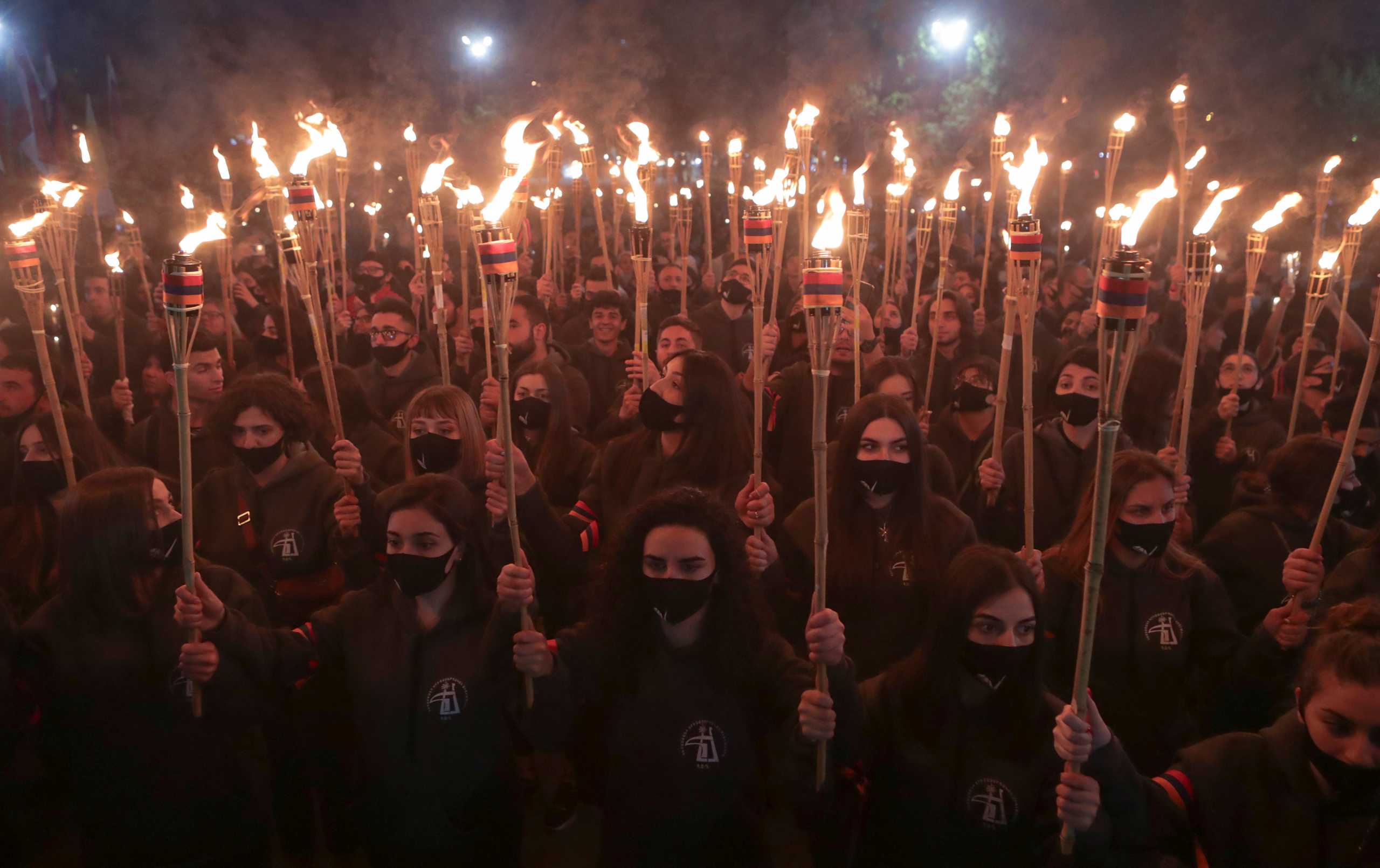 People take part in a torchlight procession to commemorate the 106th anniversary of mass killing of Armenians by Ottoman Turks in Yerevan, Armenia April 23, 2021. Vahram Baghdasaryan