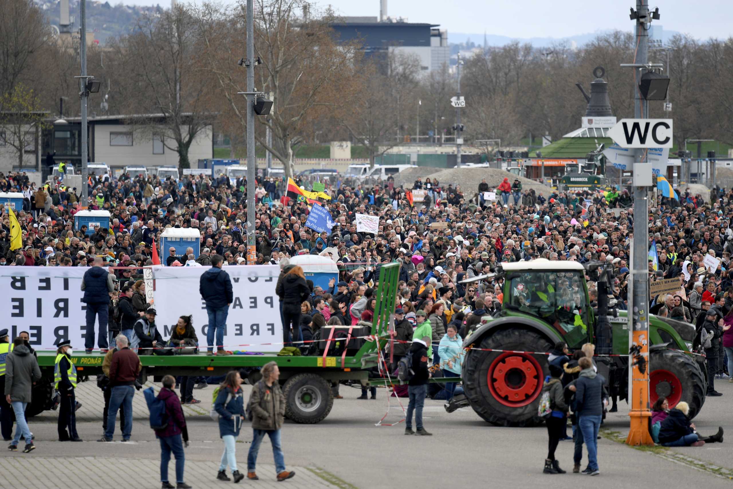 Demonstrators attend a protest against the government's coronavirus disease (COVID-19) restrictions in Stuttgart, Germany, April 3, 2021. REUTERS