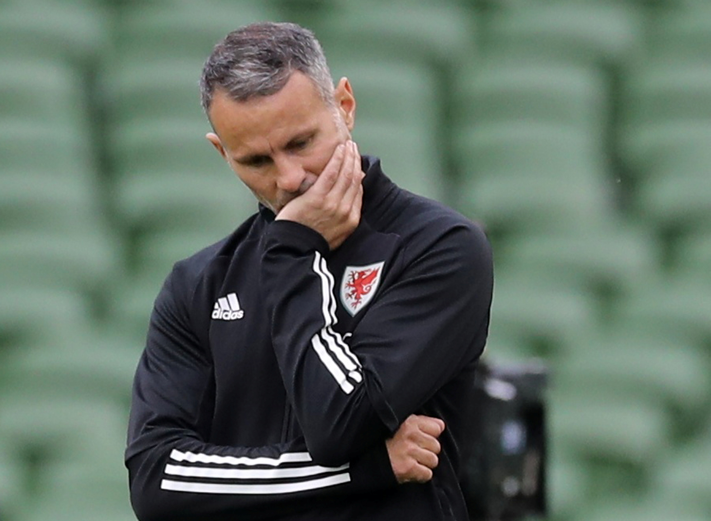 FILE PHOTO: Soccer Football - UEFA Nations League - League B - Group 4 - Republic of Ireland v Wales - Aviva Stadium, Dublin, Ireland - October 11, 2020 Wales manager Ryan Giggs during the match REUTERS