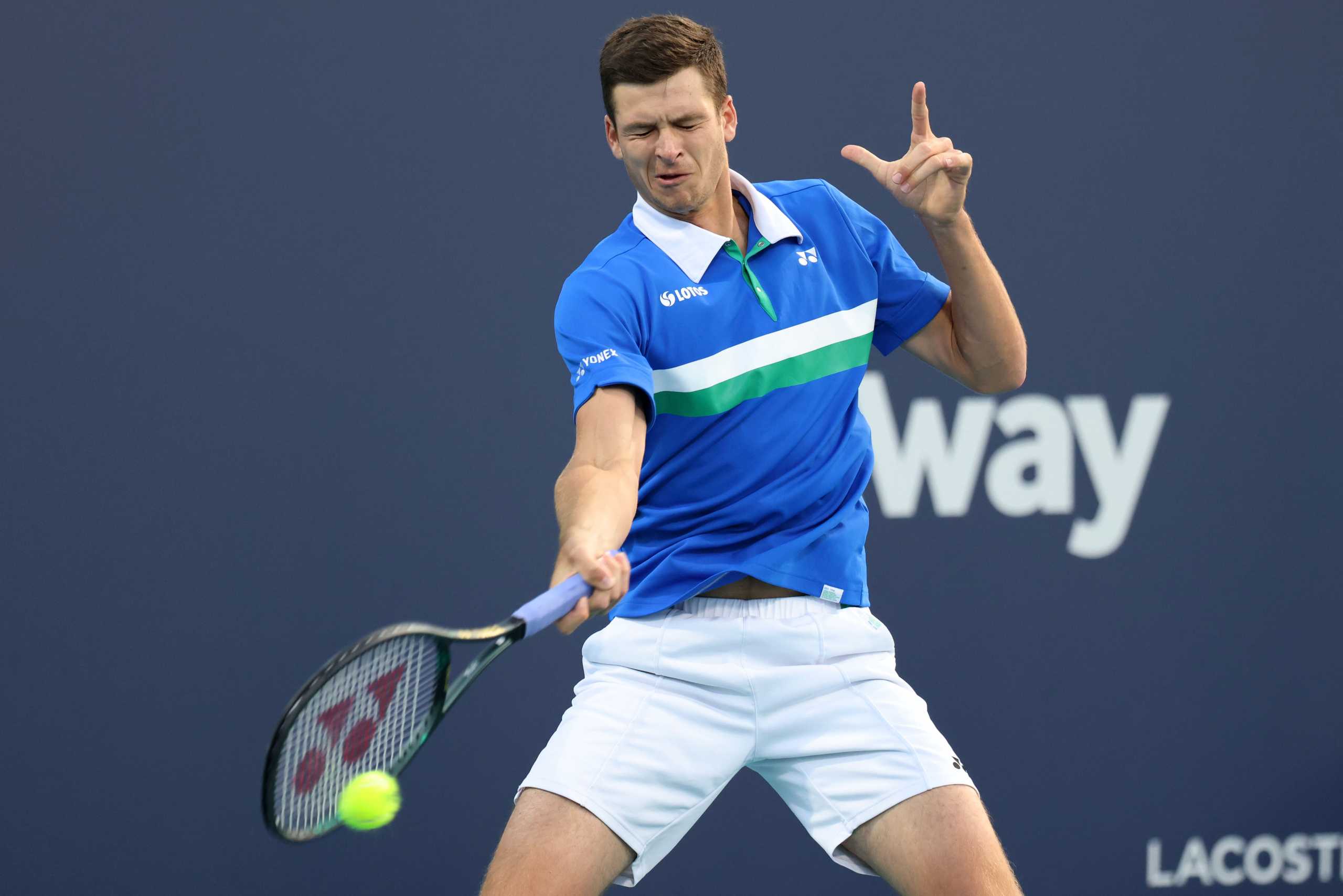 Apr 2, 2021; Miami, Florida, USA; Hubert Hurkacz of Poland hits a forehand against Andrey Rublev of Russia (not pictured) in a men's singles semifinal in the Miami Open at Hard Rock Stadium. Mandatory Credit: Geoff Burke-USA TODAY Sports