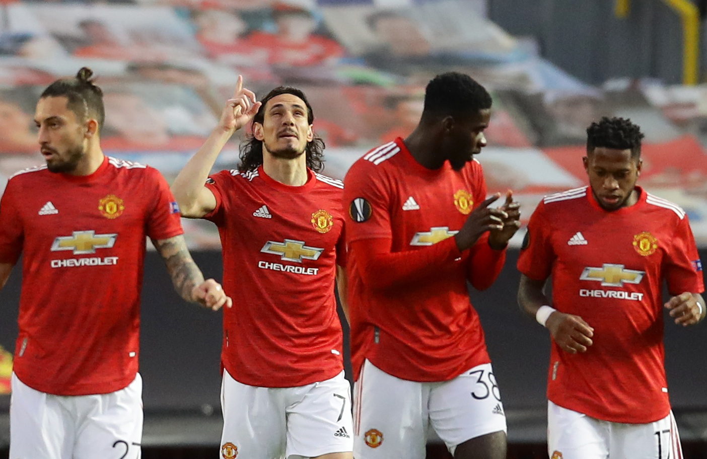 Soccer Football - Europa League - Quarter Final Second Leg - Manchester United v Granada - Old Trafford, Manchester, Britain - April 15, 2021 Manchester United's Edinson Cavani celebrates scoring their first goal with teammates REUTERS