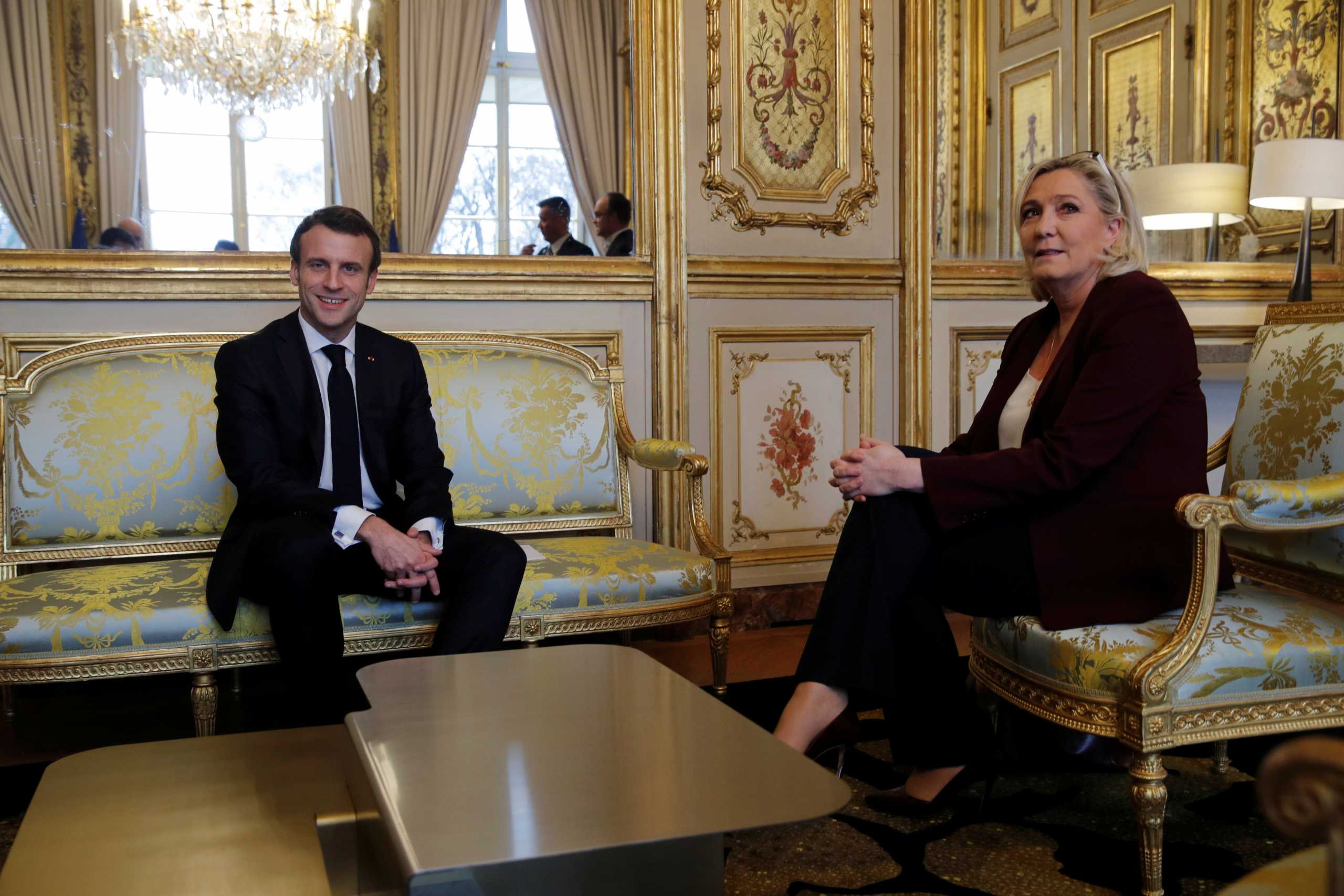 FILE PHOTO: French President Emmanuel Macron attends a meeting with French far-right National Rally (Rassemblement National) party leader Marine Le Pen at the Elysee Palace in Paris, France, February 6, 2019. REUTERS