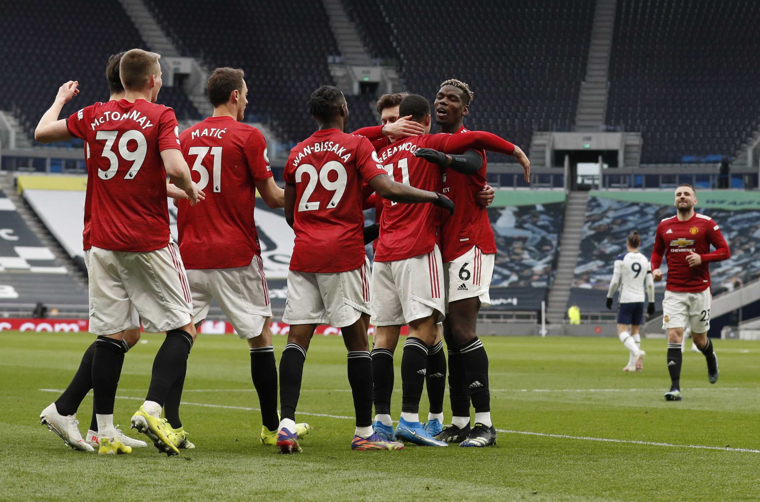 Soccer Football - Premier League - Tottenham Hotspur v Manchester United - Tottenham Hotspur Stadium, London, Britain - April 11, 2021 Manchester United's Mason Greenwood celebrates scoring their third goal with Paul Pogba and teammates Pool via REUTERS