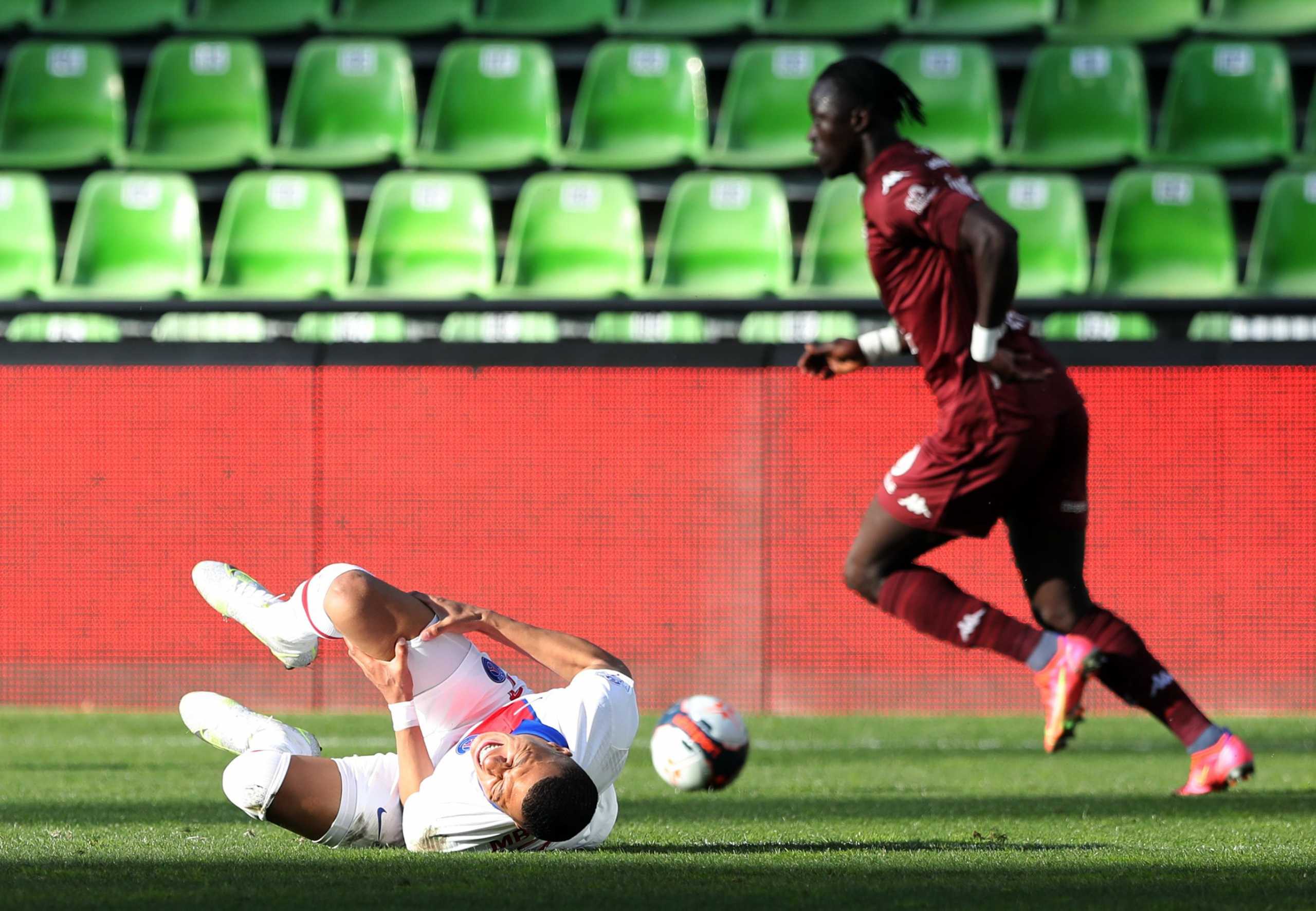 Soccer Football - Ligue 1 - Metz v Paris St Germain - Stade Saint-Symphorien, Metz, France - April 24, 2021 Paris St Germain's Kylian Mbappe reacts REUTERS