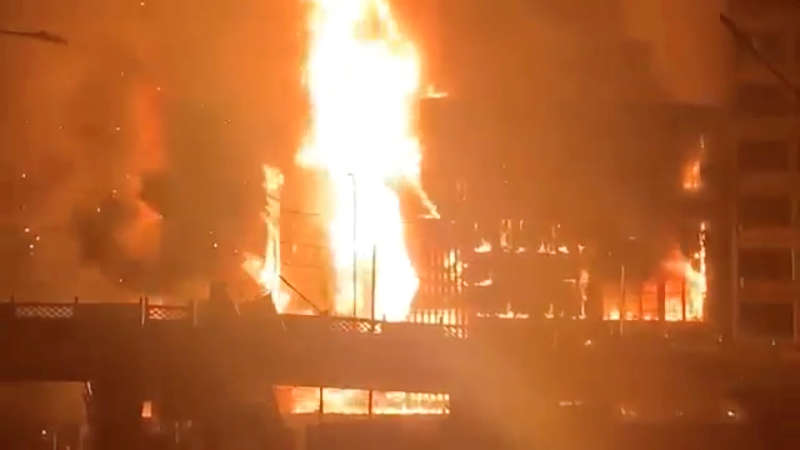 Ruby Mart is engulfed in flames, in Yangon, Myanmar in this still image taken from social media video obtained by Reuters, April 1, 2021. Social Media video