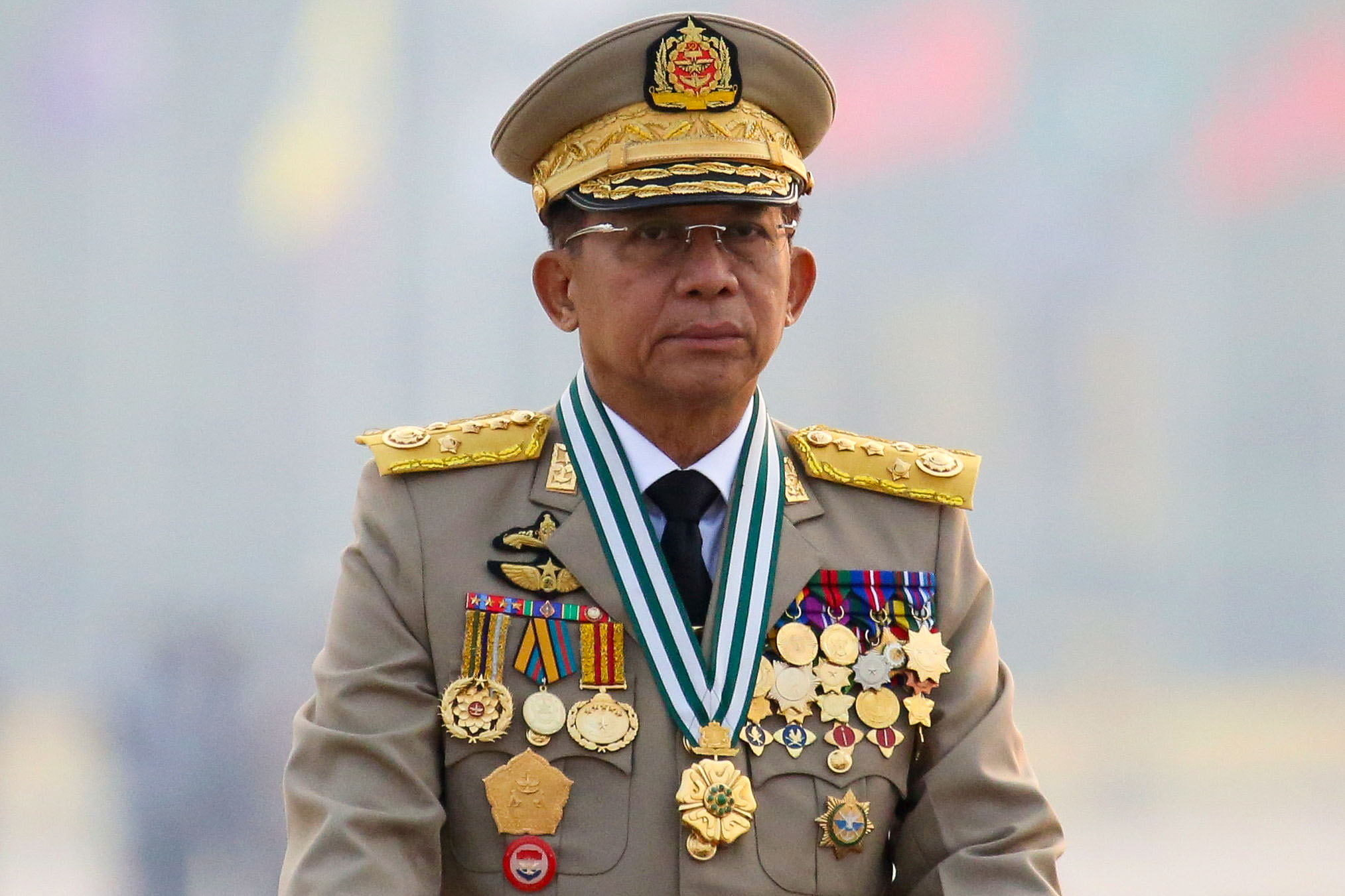 FILE PHOTO: Myanmar's junta chief Senior General Min Aung Hlaing, who ousted the elected government in a coup on February 1, presides an army parade on Armed Forces Day in Naypyitaw, Myanmar, March 27, 2021. REUTERS