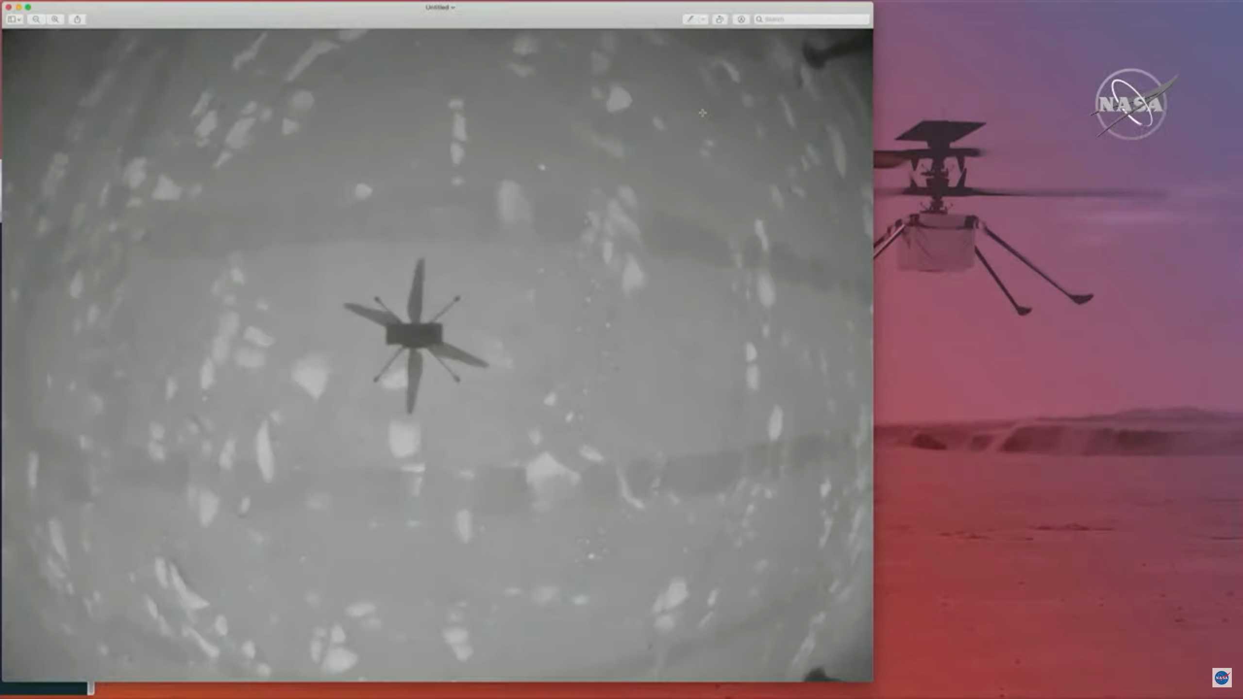 The shadow of NASA's Mars helicopter Ingenuity is seen during its first flight on the planet in this still image taken from a video on April 19, 2021. NASA