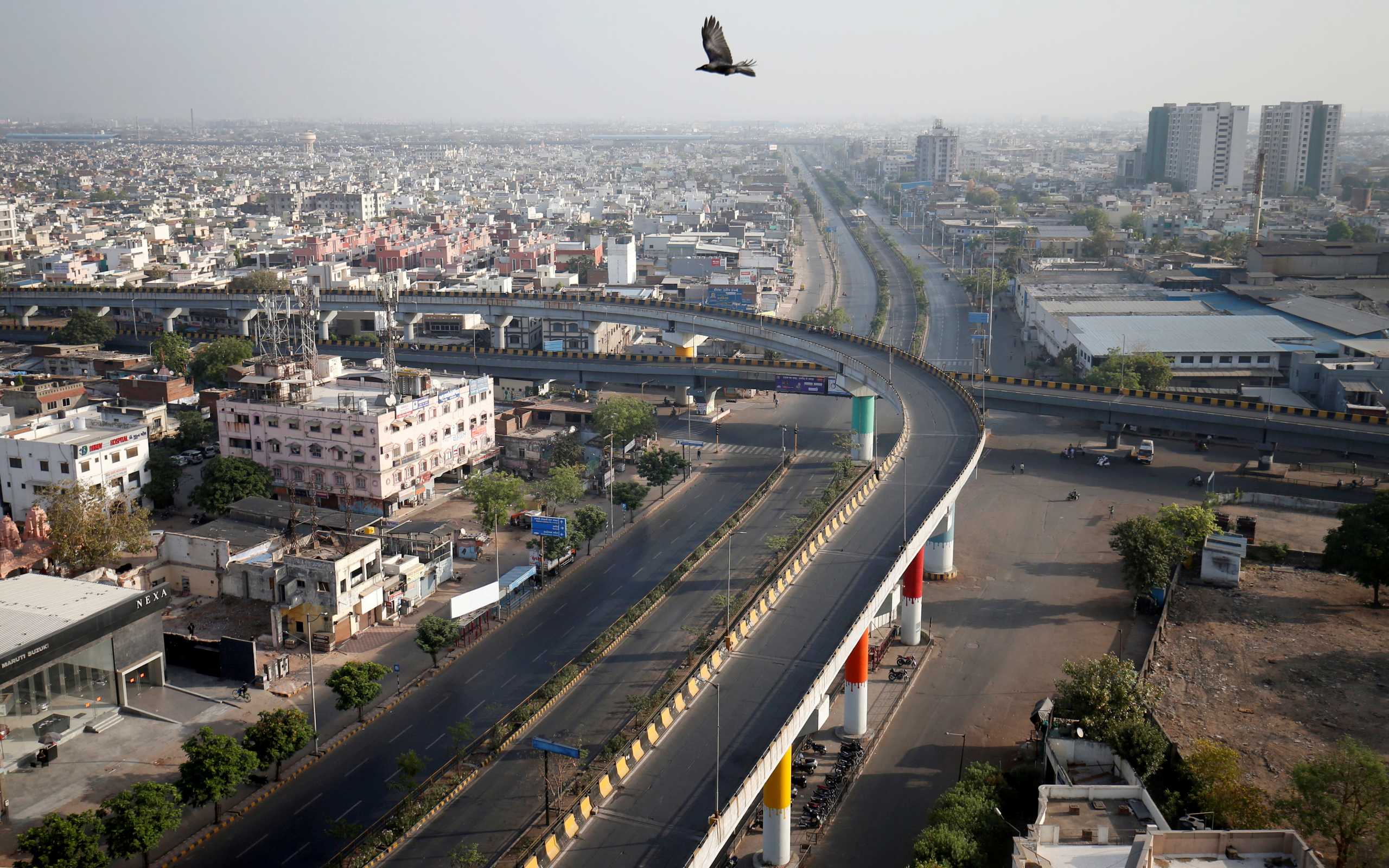 FILE PHOTO: A view shows empty roads during a 14-hour long curfew to limit the spreading of coronavirus disease (COVID-19) in the country, in Ahmedabad, India, March 22, 2020. REUTERS