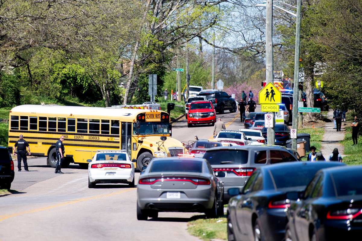 Police attend a shooting at Austin-East Magnet High School in Knoxville, Tennessee, U.S. April 12, 2021.   Brianna Paciorka