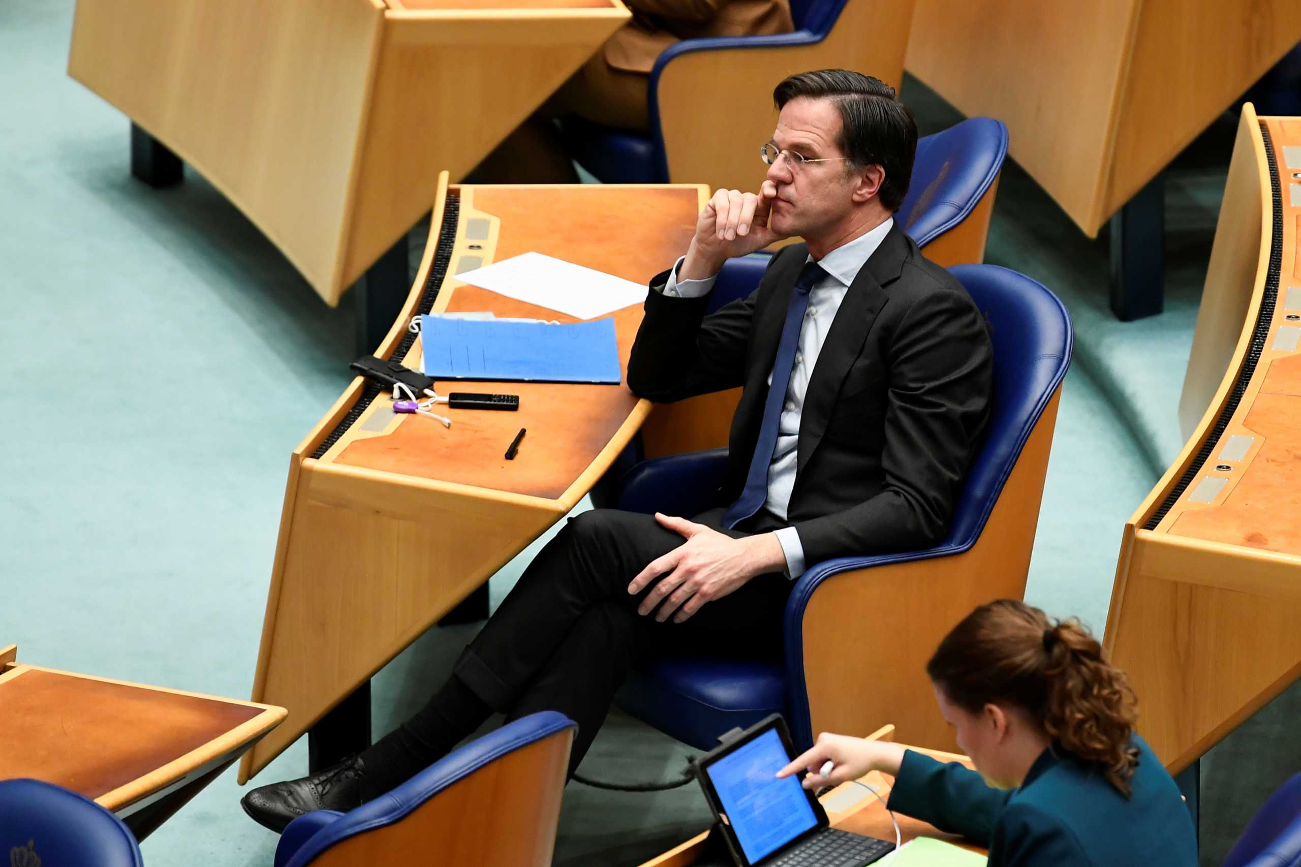 Dutch Prime Minister Mark Rutte attends a debate over remarks he made during talks to form a new government following the March 17 national elections, in The Hague, Netherlands April 1, 2021. REUTERS