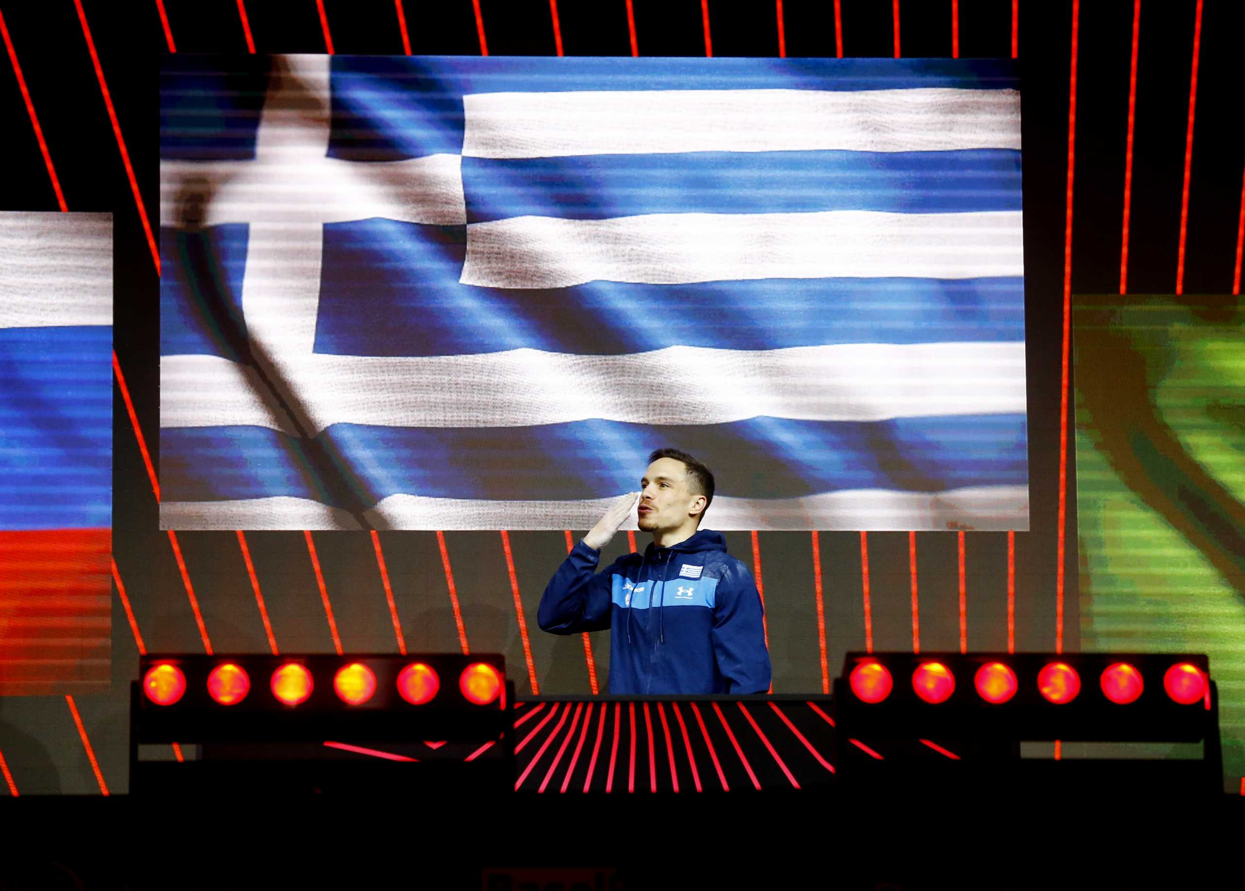 Gymnastics - 2021 European Artistic Gymnastics Championships - St. Jakobshalle, Basel, Switzerland - April 24, 2021 Greece’s Eleftherios Petrounias celebrates on the podium after winning the men’s all-round final rings REUTERS