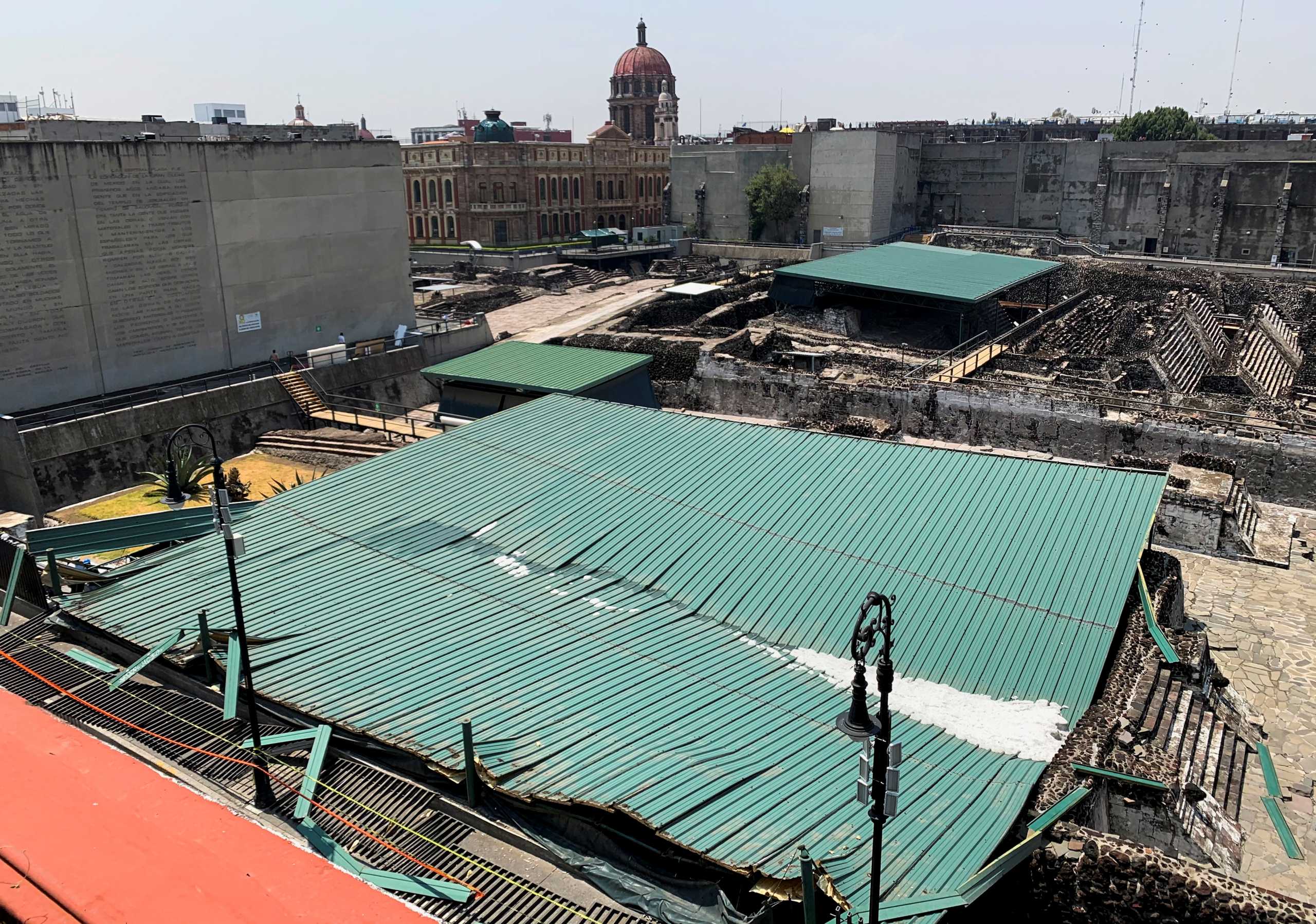 A view shows the collapsed roof that protected the "Casa de las Aguilas", part of the ruins of the Templo Mayor archaeological site, after heavy rain and hail, in downtown Mexico City, Mexico April 29, 2021. REUTERS