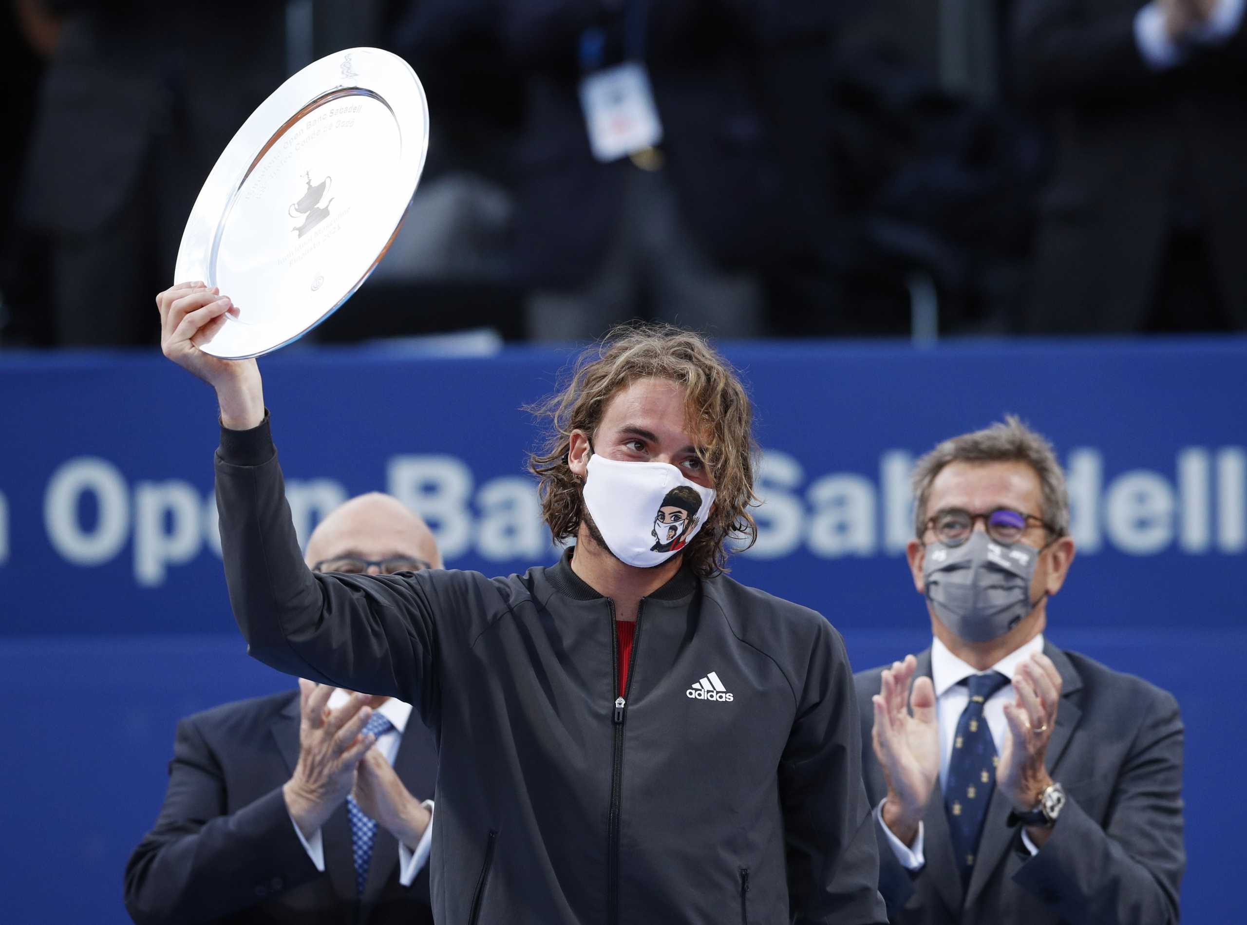 Tennis - ATP 500 - Barcelona Open - Real Club de Tennis Barcelona, Barcelona, Spain - April 25, 2021 Greece's Stefanos Tsitsipas holds a runners up trophy after losing the final against Spain's Rafael Nadal REUTERS