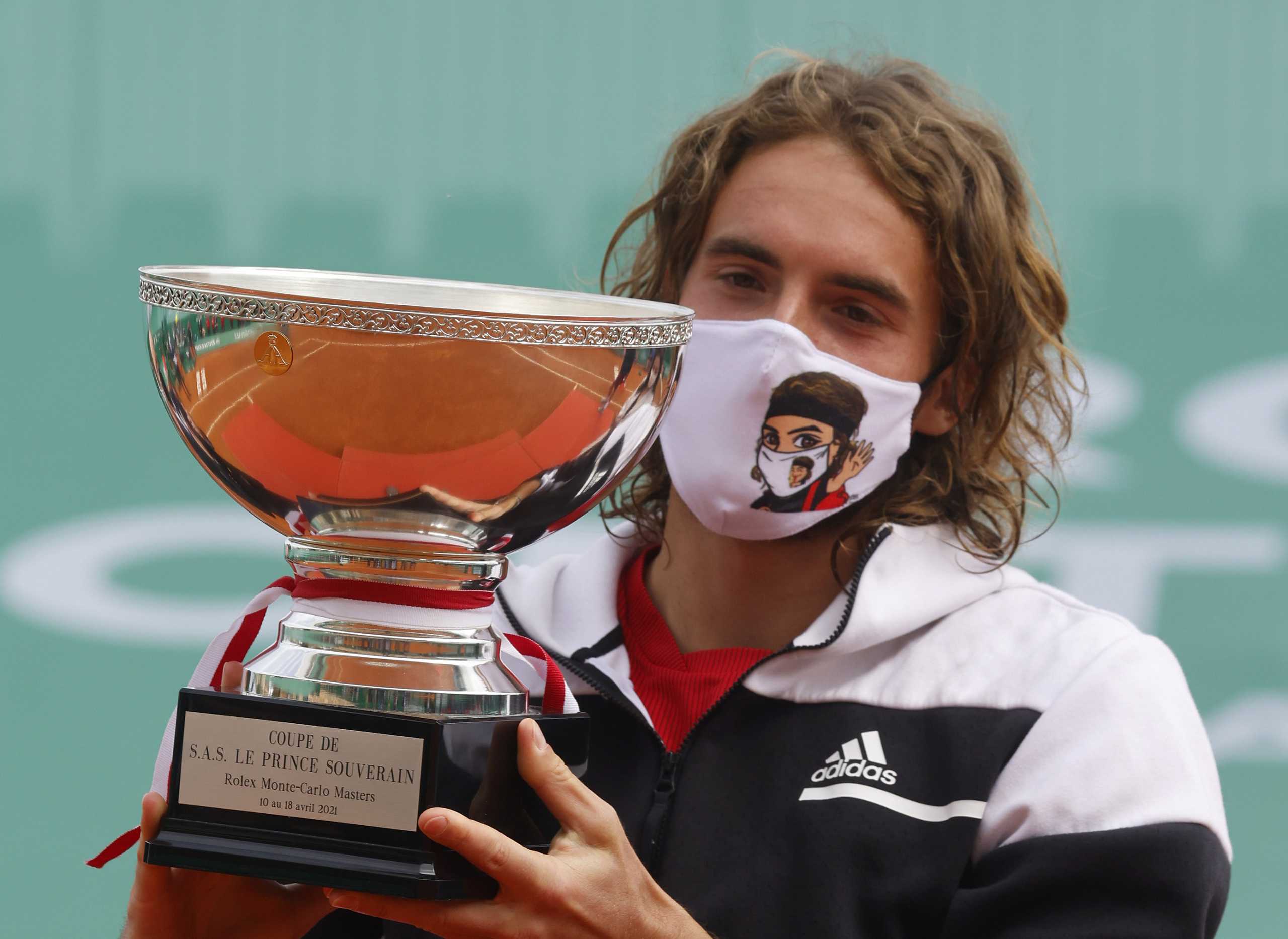 Tennis - ATP Masters 1000 - Monte Carlo Masters - Monte-Carlo Country Club, Roquebrune-Cap-Martin, France - April 18, 2021 Greece's Stefanos Tsitsipas celebrates winning the final match against Russia's Andrey Rublev with the trophy REUTERS