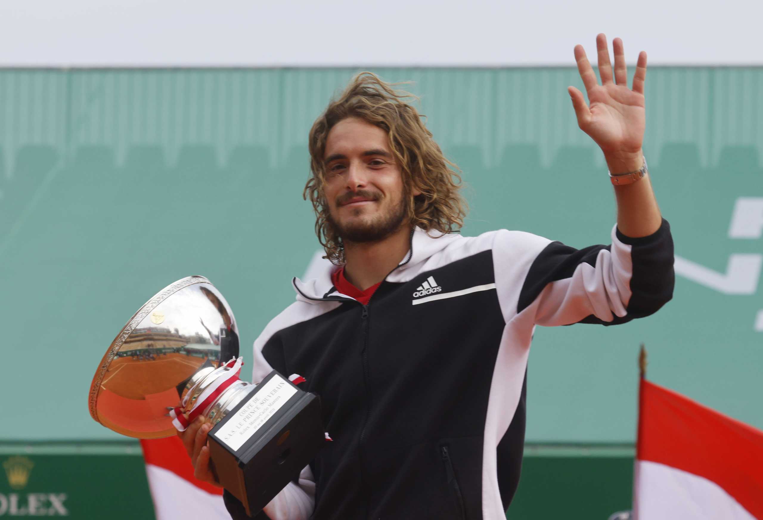 Tennis - ATP Masters 1000 - Monte Carlo Masters - Monte-Carlo Country Club, Roquebrune-Cap-Martin, France - April 18, 2021 Greece's Stefanos Tsitsipas celebrates winning the final match against Russia's Andrey Rublev with the trophy REUTERS