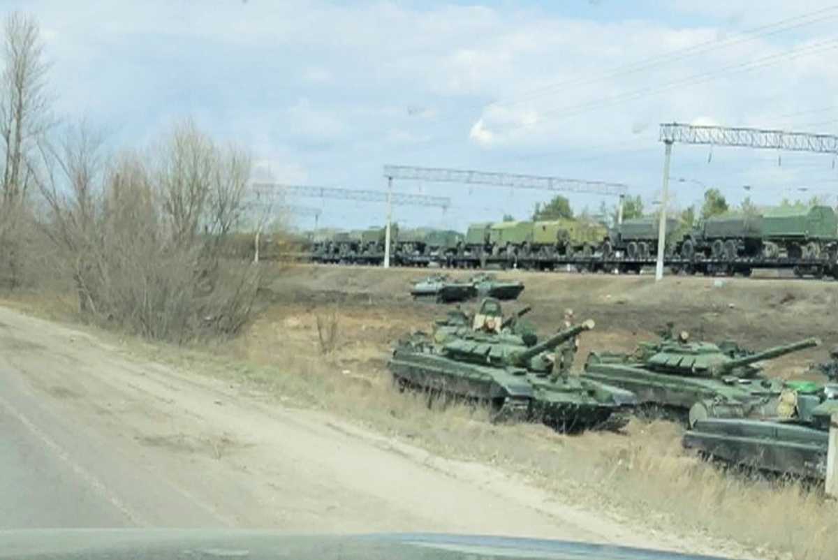 FILE PHOTO: A still image from video shows tanks and military vehicles in Maslovka, Voronezh Region, Russia April 6, 2021. Video taken April 6, 2021. Video by REUTERS. THIS IMAGE WAS PROCESSED BY REUTERS TO ENHANCE QUALITY, AN UNPROCESSED VERSION HAS BEEN PROVIDED SEPARATELY.