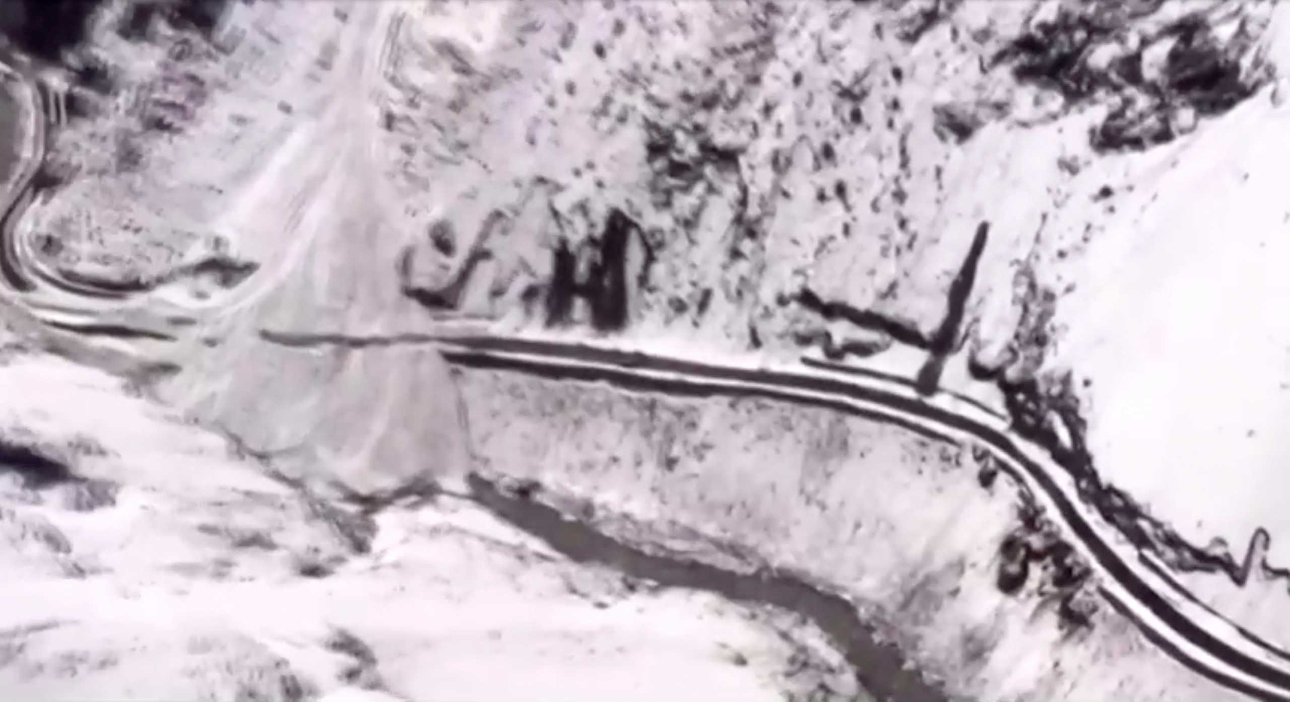 Aerial view after a glacier broke triggering an avalanche close to the Indo-China border in the Indian state of Uttarakhand on Friday, in this screen grab taken from a video April 24, 2021 . ANI
