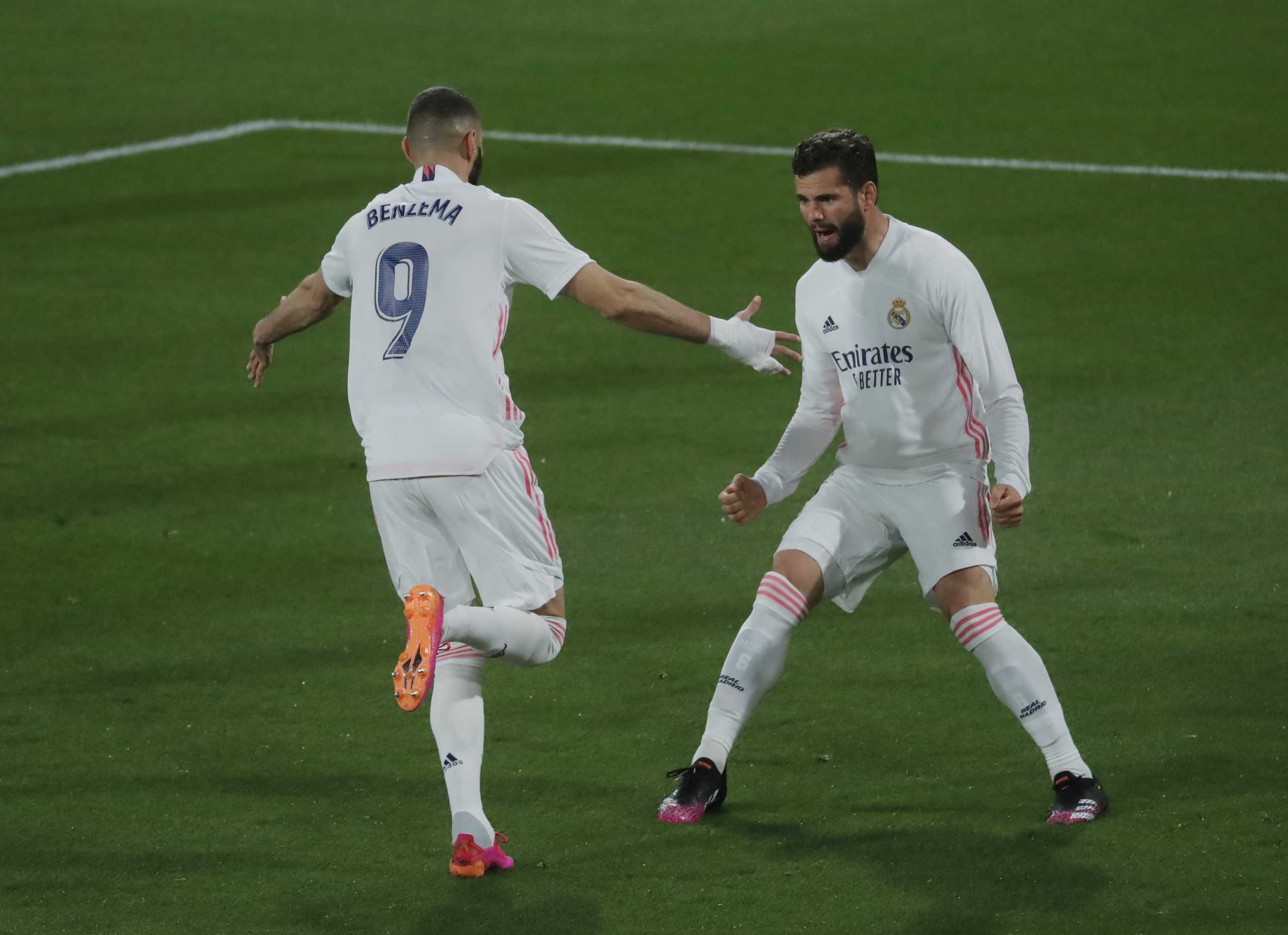 Soccer Football - La Liga Santander - Cadiz v Real Madrid - Estadio Ramon de Carranza, Cadiz, Spain - April 21, 2021 Real Madrid's Karim Benzema celebrates scoring their first goal REUTERS