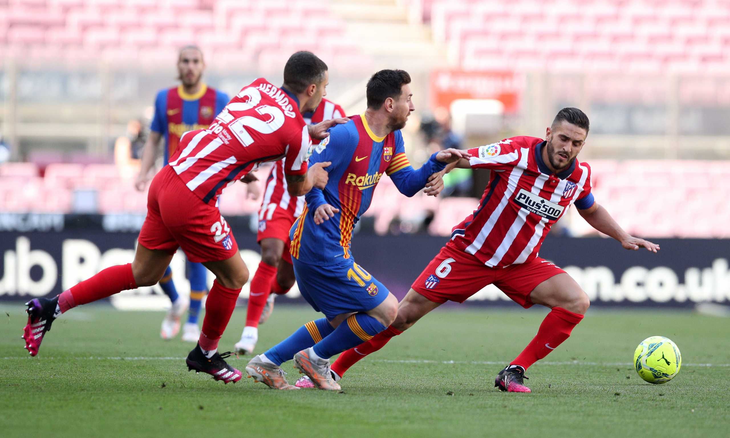 Soccer Football - La Liga Santander - FC Barcelona v Atletico Madrid - Camp Nou, Barcelona, Spain - May 8, 2021 FC Barcelona's Lionel Messi in action with Atletico Madrid's Koke REUTERS