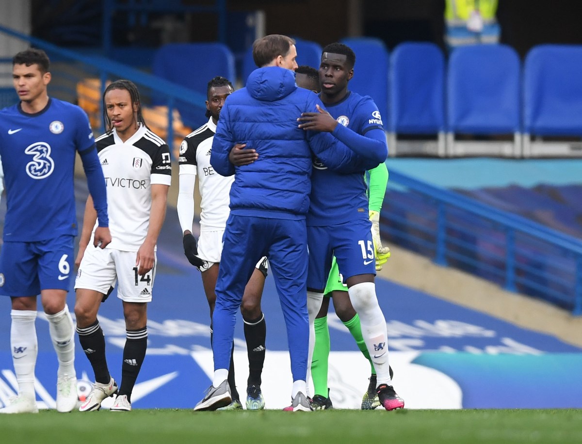 Soccer Football - Premier League - Chelsea v Fulham - Stamford Bridge, London, Britain - May 1, 2021 Chelsea manager Thomas Tuchel and Kurt Zouma after the match Pool via REUTERS