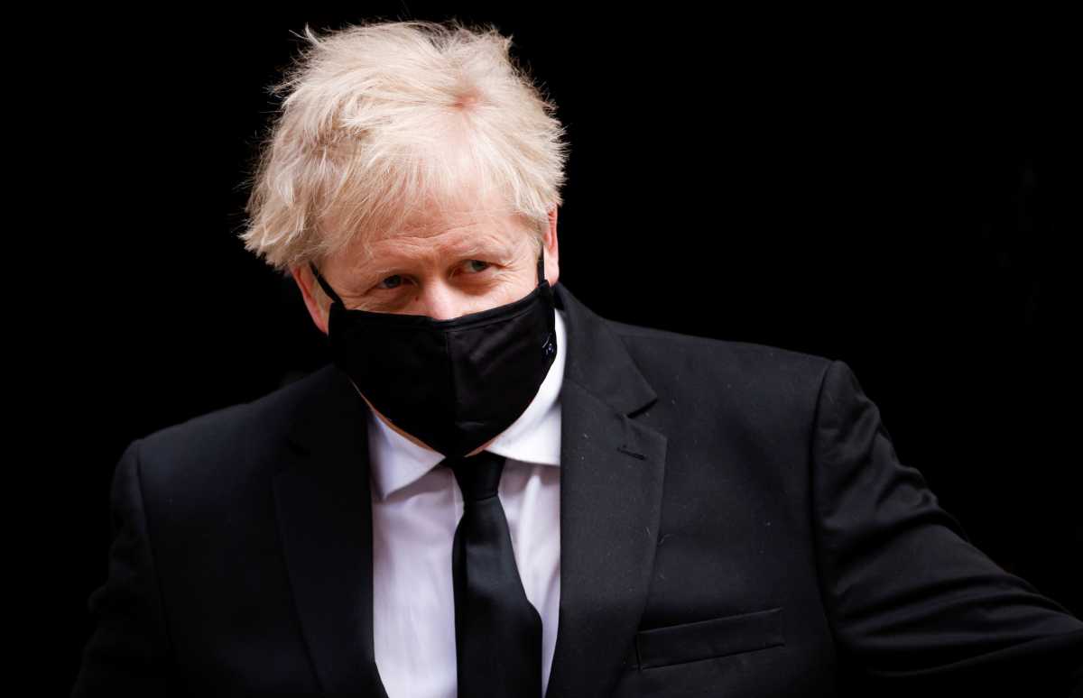 FILE PHOTO: Britain's Prime Minister Boris Johnson walks outside Downing Street, amid the coronavirus disease (COVID-19) pandemic, in London, Britain, April 14, 2021. REUTERS