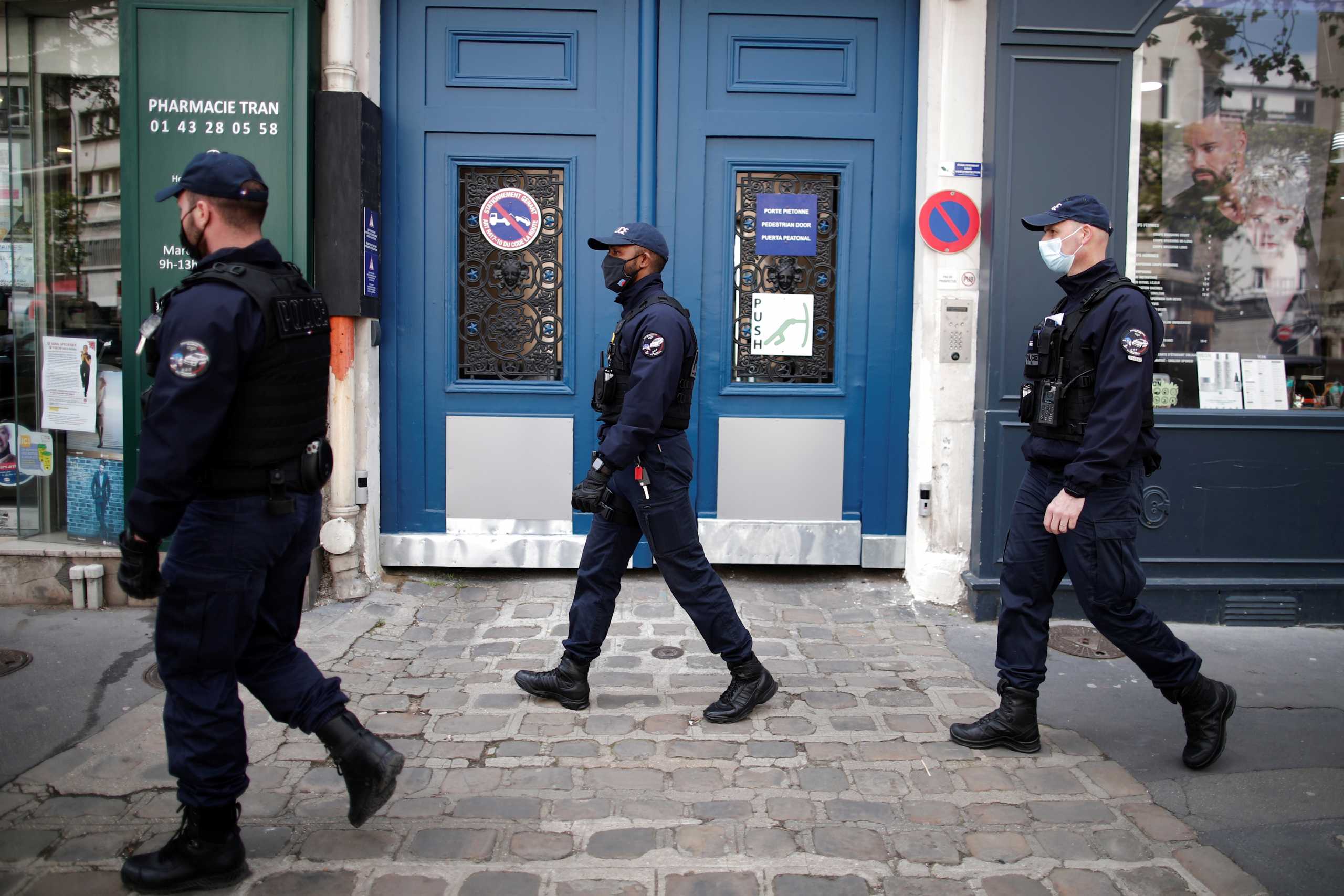 Police officers make a routine check in restaurants to verify compliance with COVID-19 sanitary measures in Vincennes, near Paris, amid the coronavirus disease (COVID-19) outbreak in France, April 29, 2021. REUTERS