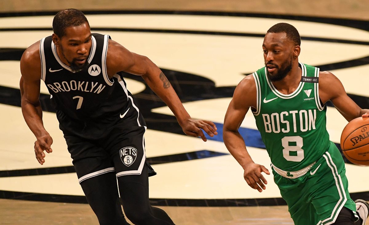 May 22, 2021; Brooklyn, New York, USA;  Boston Celtics guard Kemba Walker (8) drives the ball defended by Brooklyn Nets forward Kevin Durant (7) during the first quarter of game one in the first round of the 2021 NBA Playoffs. at Barclays Center. Mandatory Credit: Dennis Schneidler-USA TODAY Sports