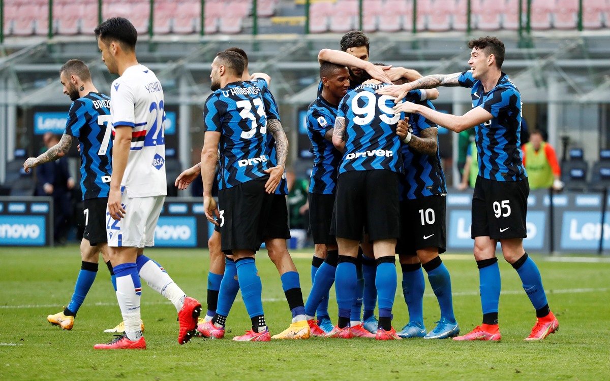 Soccer Football - Serie A - Inter Milan v Sampdoria - San Siro, Milan, Italy - May 8, 2021 Inter Milan's Andrea Pinamonti celebrates scoring their fourth goal with teammates REUTERS