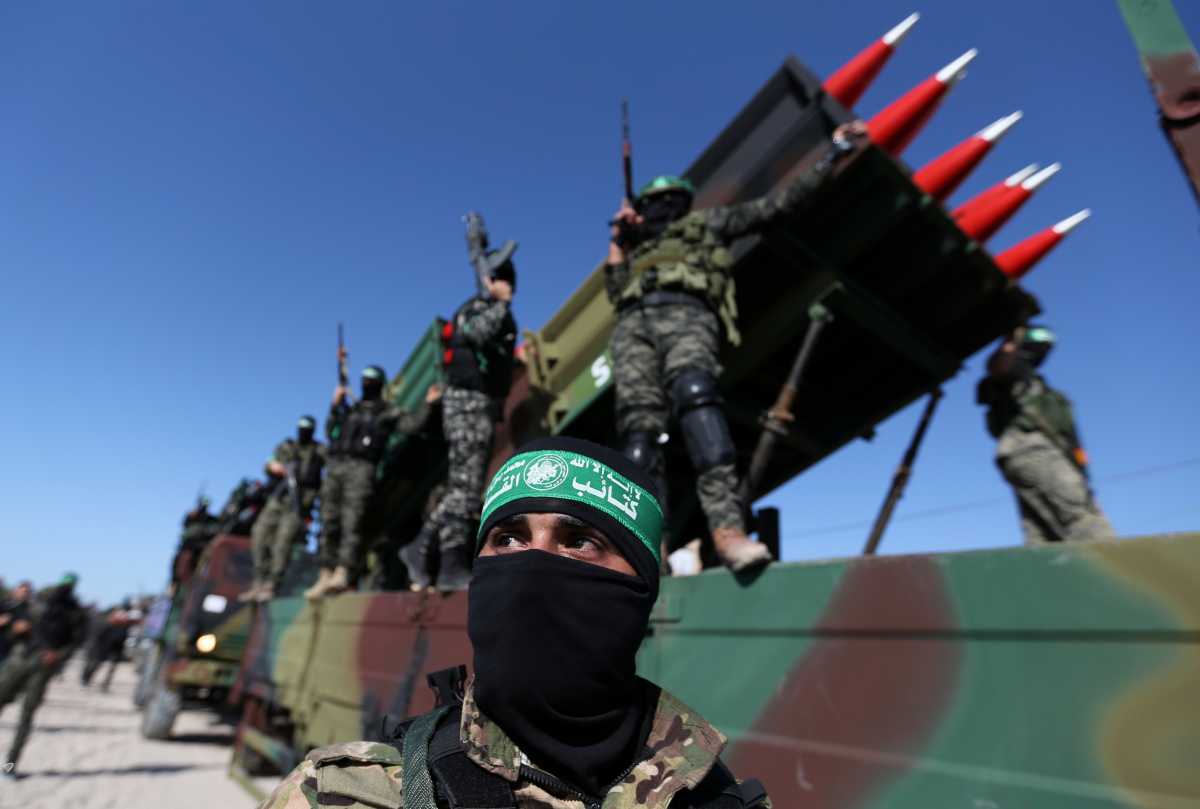 Palestinian Hamas militants attend an anti-Israel rally in Khan Younis, in the southern Gaza Strip May 27, 2021. REUTERS