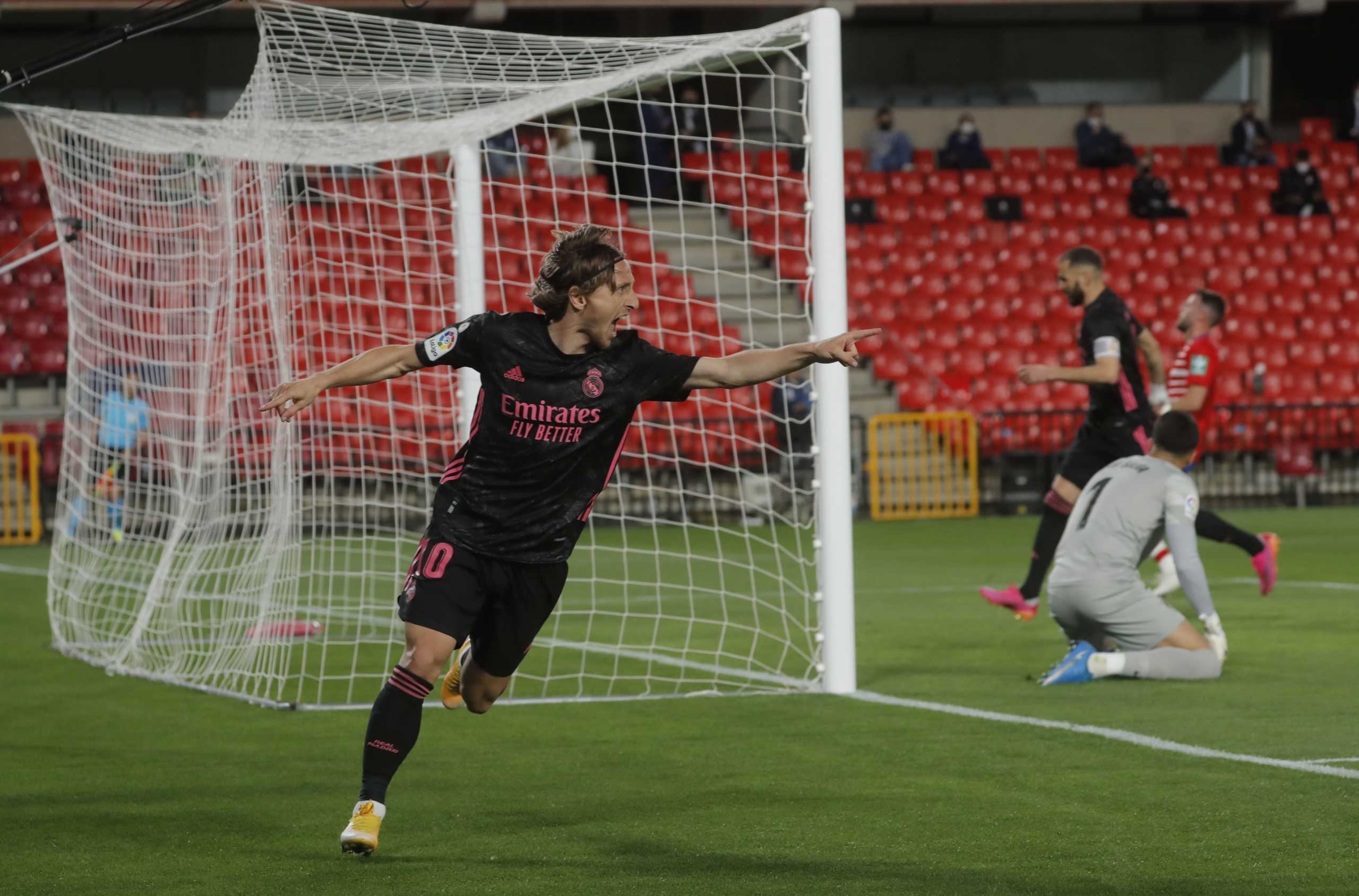 Soccer Football - La Liga Santander - Granada v Real Madrid - Nuevo Estadio de Los Carmenes, Granada, Spain - May 13, 2021 Real Madrid's Luka Modric celebrates scoring their first goal REUTERS