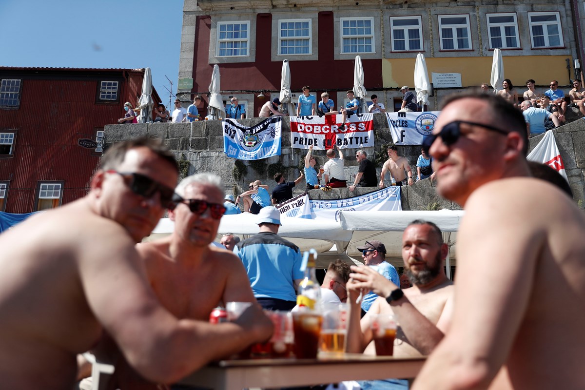 Soccer Football - Champions League - Fans in Porto ahead of the Champions League Final Manchester City v Chelsea - Porto, Portugal - May 29, 2021 Manchester City fans gather in Porto ahead of the match REUTERS