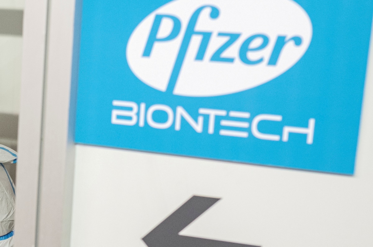FILE PHOTO: A man receives a second dose of the Pfizer-BioNTech vaccine against the coronavirus disease (COVID-19) at the hall three of the Belgrade Fair, in Belgrade, Serbia, April 13, 2021. REUTERS