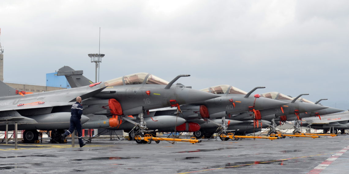 FILE PHOTO: French Navy Rafale fighter jets are seen onboard the Charles de Gaulle aircraft carrier, currently moored at the port of Limassol, Cyprus February 21, 2020. REUTERS