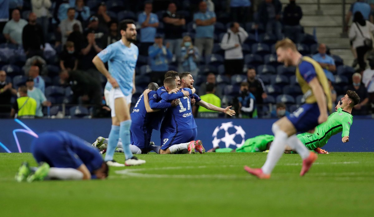 Soccer Football - Champions League Final - Manchester City v Chelsea - Estadio do Dragao, Porto, Portugal - May 29, 2021 Chelsea players celebrate after winning the Champions League Pool via REUTERS