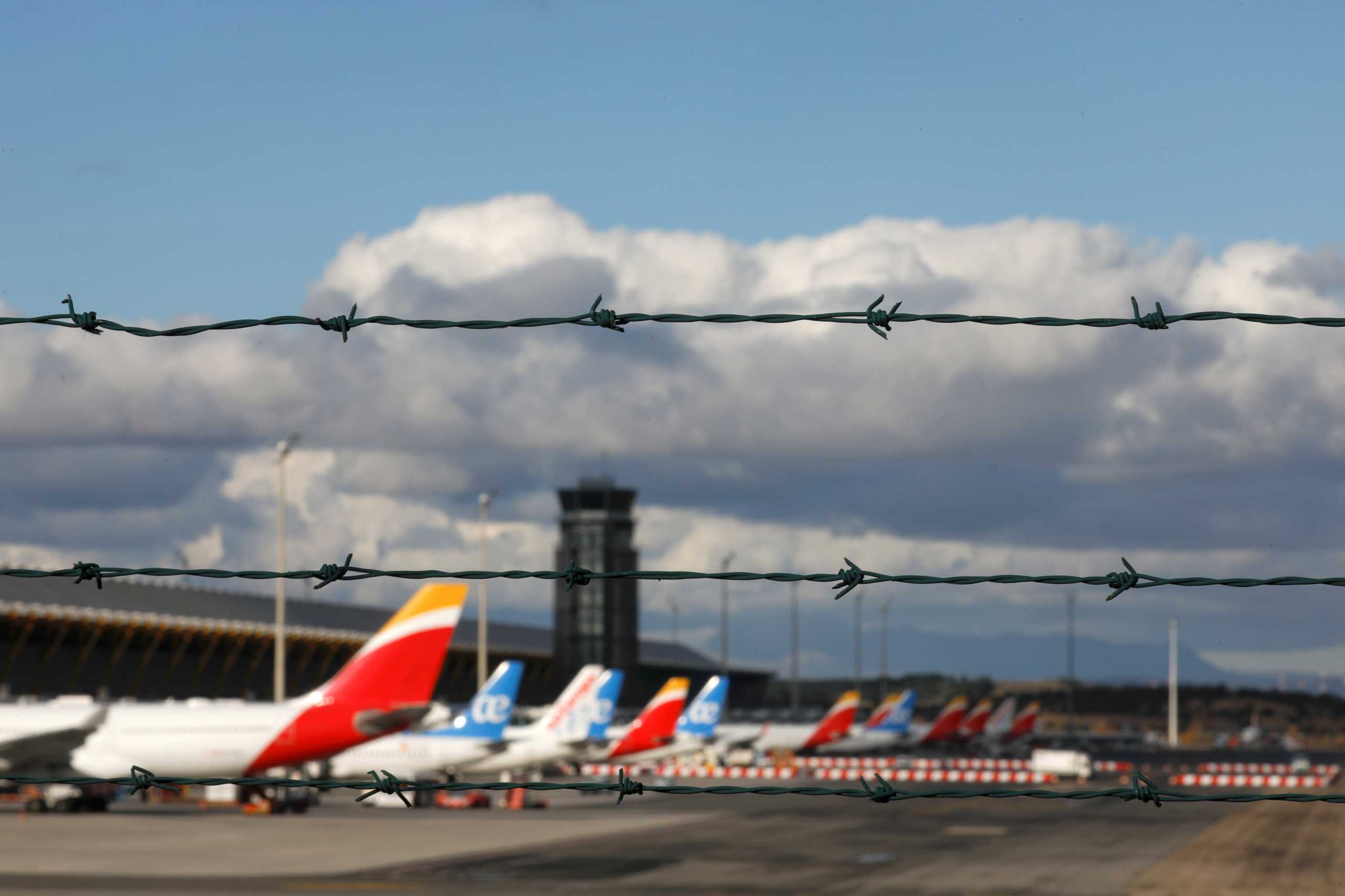 FILE PHOTO: Iberia and Air Europa airplanes are parked at a tarmack at Adolfo Suarez Barajas airport amid the coronavirus disease (COVID-19) pandemic in Madrid, Spain, December 15, 2020. REUTERS