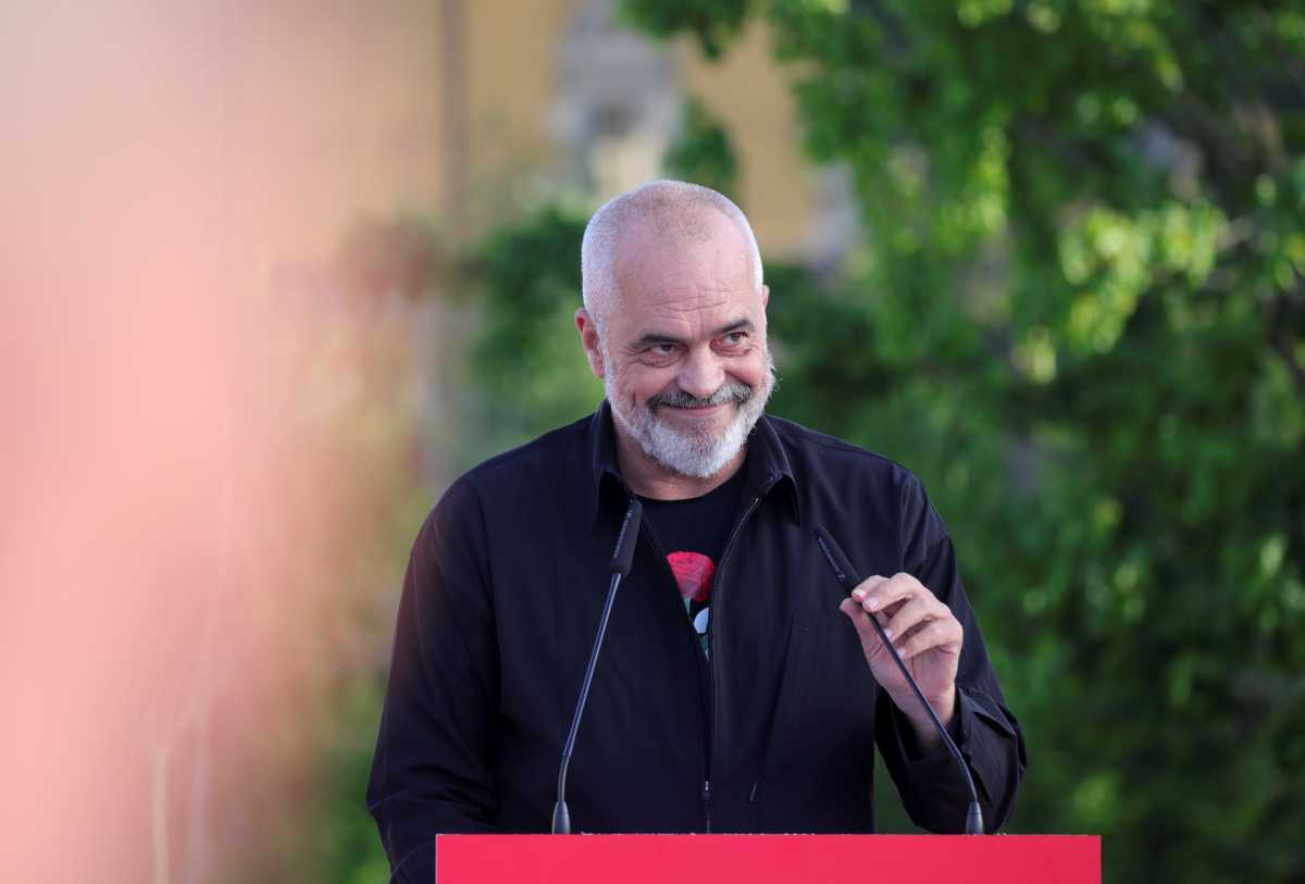 Albanian Prime Minister and leader of the Socialist Party Edi Rama smiles at a rally celebrating the party's election victory, at Skanderbeg Square in Tirana, Albania April 27, 2021. REUTERS