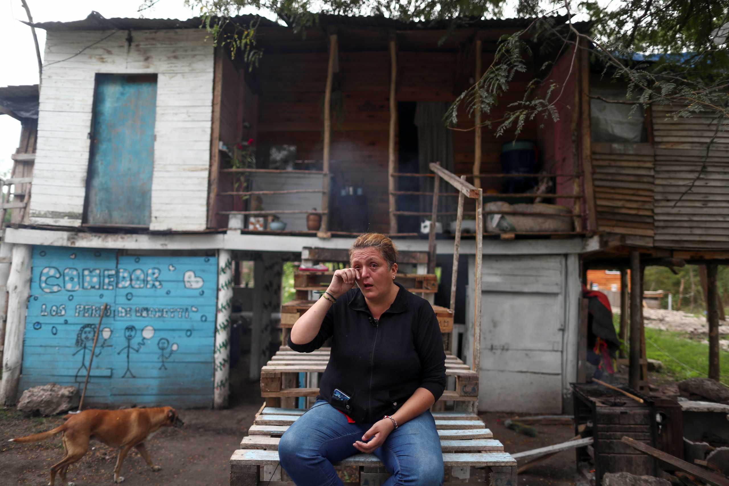 Aida Mariela Unayche, 43, gets emotional as she speaks with Reuters outside her home, in Manzanares, on the outskirts of Buenos Aires, Argentina April 8, 2021. Picture taken April 8, 2021. REUTERS