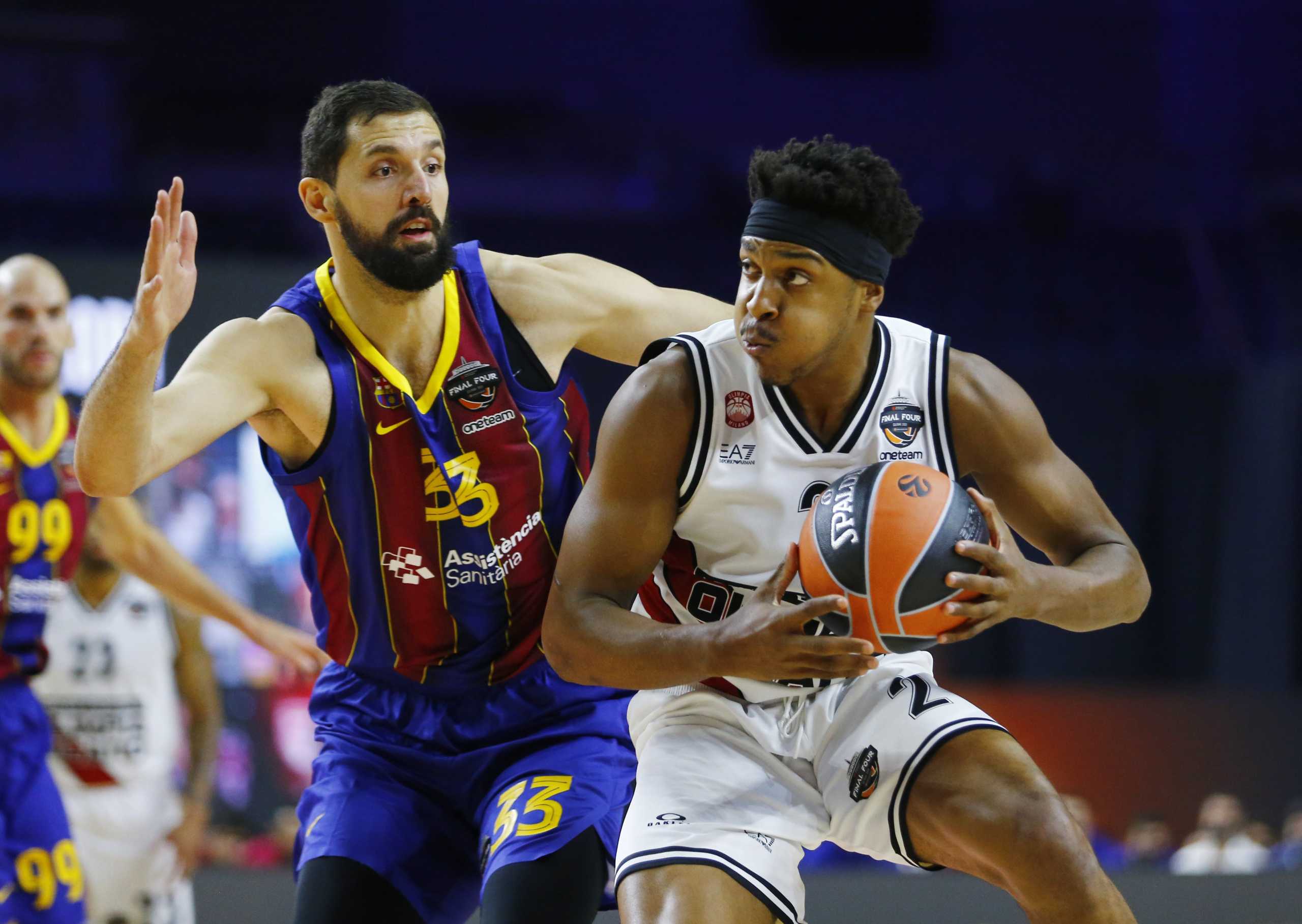 Basketball - Euroleague Final Four - FC Barcelona v Olimpia Milano - Lanxess Arena, Cologne, Germany - May 28, 2021 FC Barcelona's Nikola Mirotic in action with Olimpia Milano's Zach LeDay REUTERS