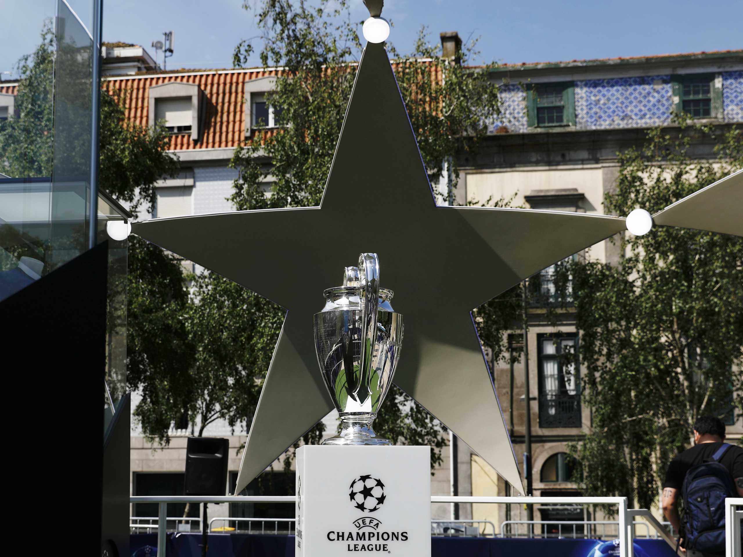 Soccer Football - Champions League - Fans in Porto ahead of the Champions League Final Manchester City v Chelsea - Porto, Portugal - May 28, 2021 General view of the Champions League trophy on a plinth in Porto ahead of the Champions League Final REUTERS