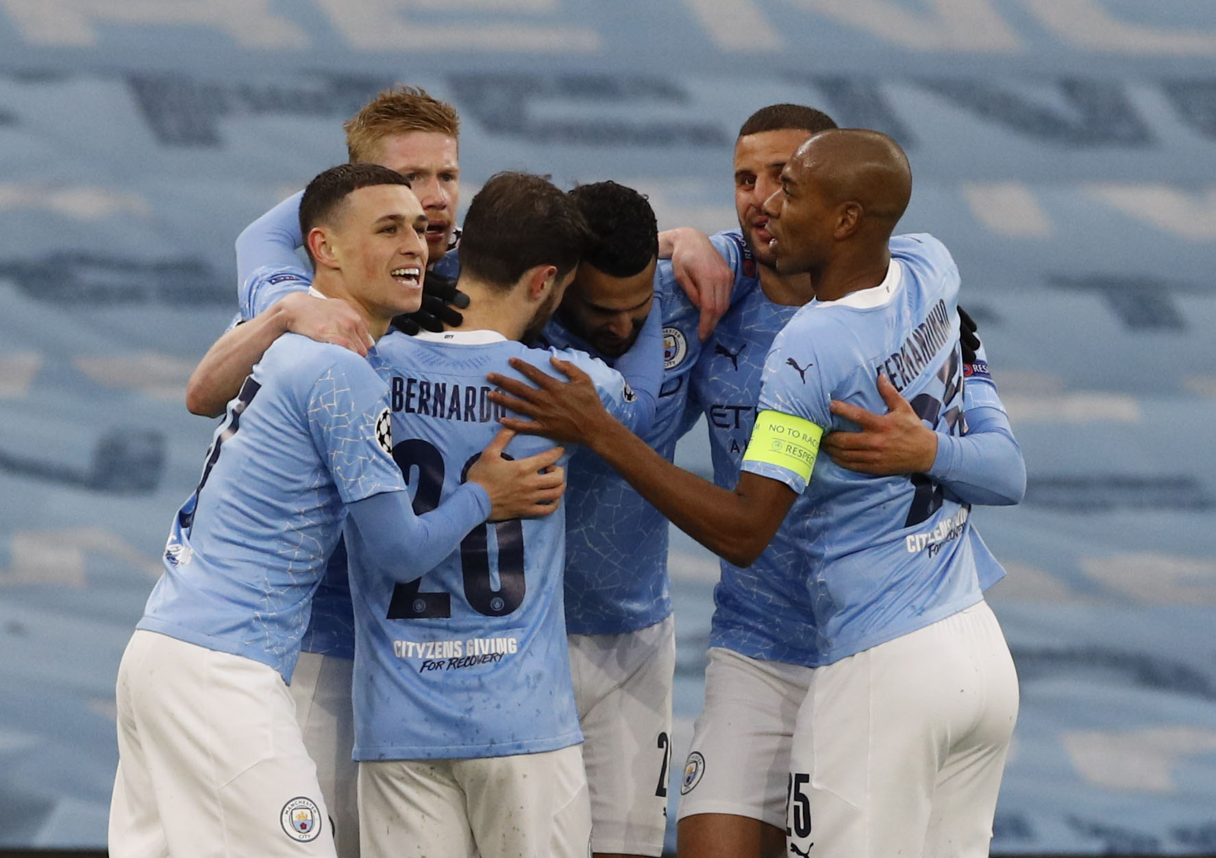 Soccer Football - Champions League - Semi Final Second Leg - Manchester City v Paris St Germain - Etihad Stadium, Manchester, Britain - May 4, 2021 Manchester City's Riyad Mahrez celebrates scoring their first goal with teammates REUTERS