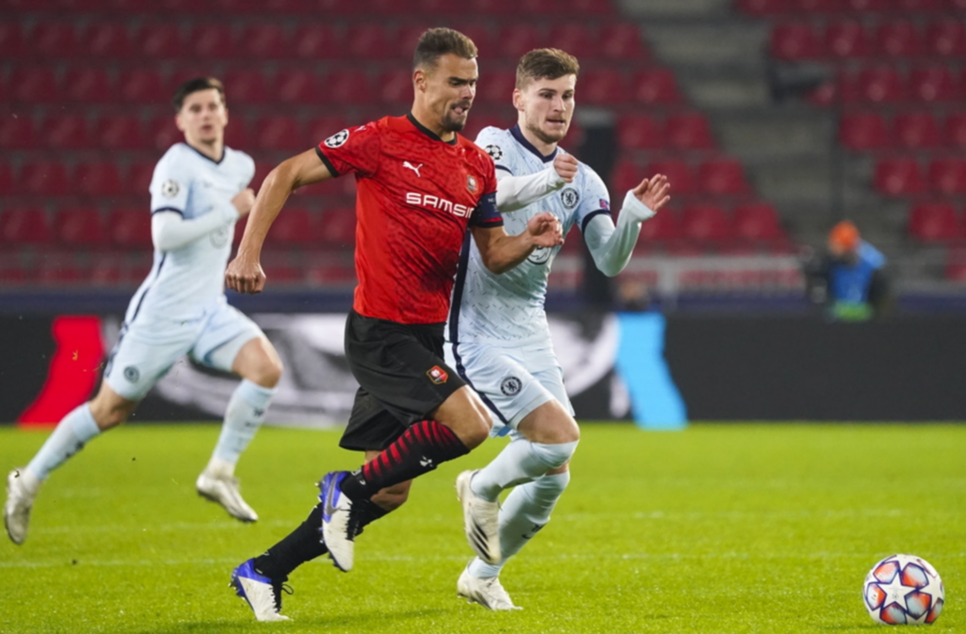 epa08839678 Damien Da Silva (C) of Rennes in action against Timo Werner (R) of Chelsea during the UEFA Champions League group E soccer match between Stade Rennes and Chelsea FC in Rennes, France, 24 November 2020.  EPA