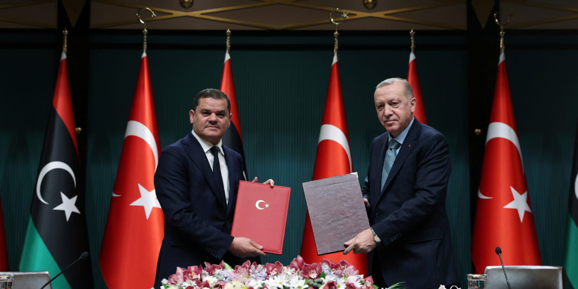 Turkish President Tayyip Erdogan and Libyan Prime Minister Abdulhamid?Dbeibeh pose during a signing ceremony in Ankara, Turkey April 12, 2021. Presidential Press Office