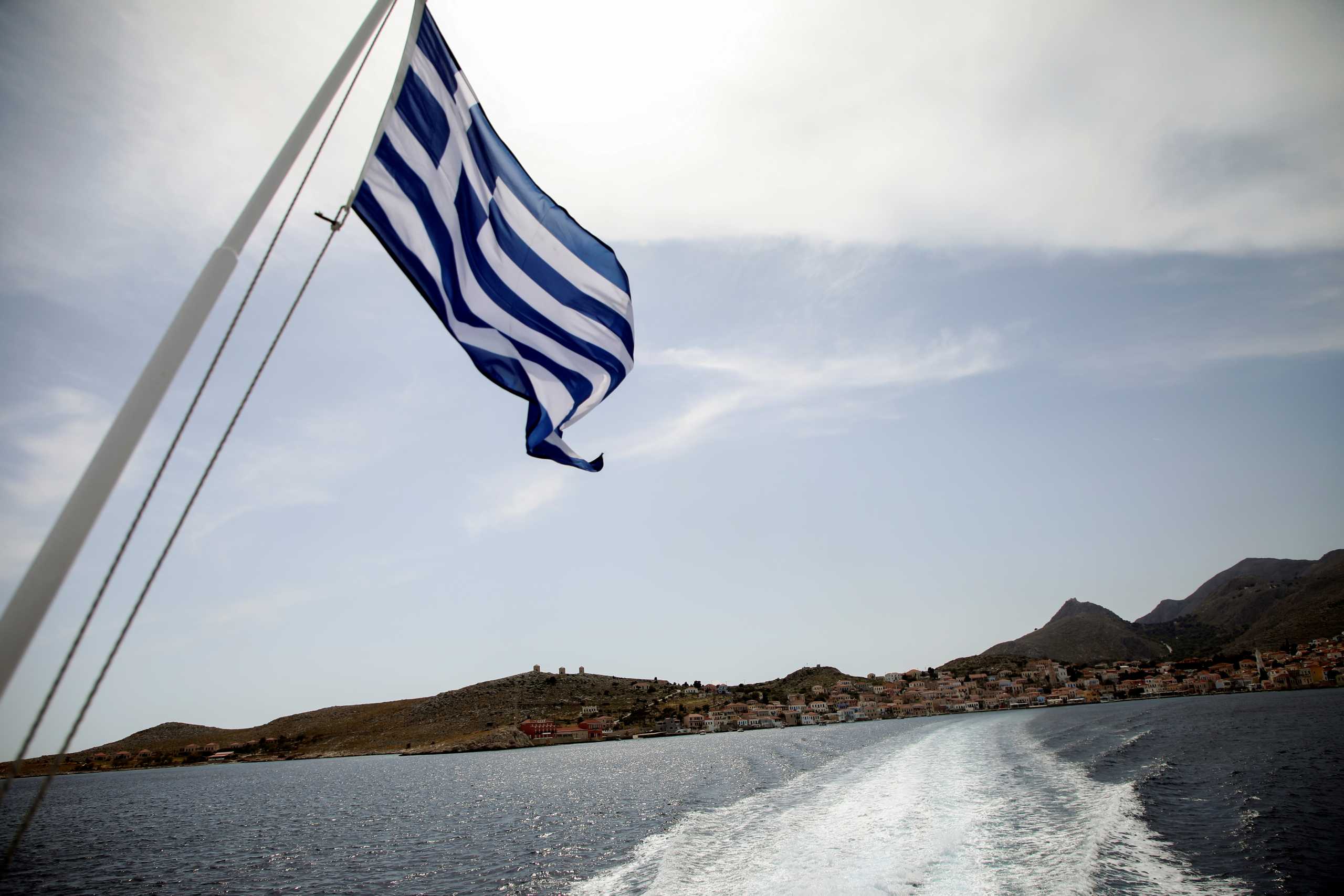 FILE PHOTO: View of the island of Halki from a ferry sailing to the island of Rhodes, amid the coronavirus disease (COVID-19) pandemic, off the island of Halki, Greece, April 13, 2021. Picture taken April 13, 2021. REUTERS