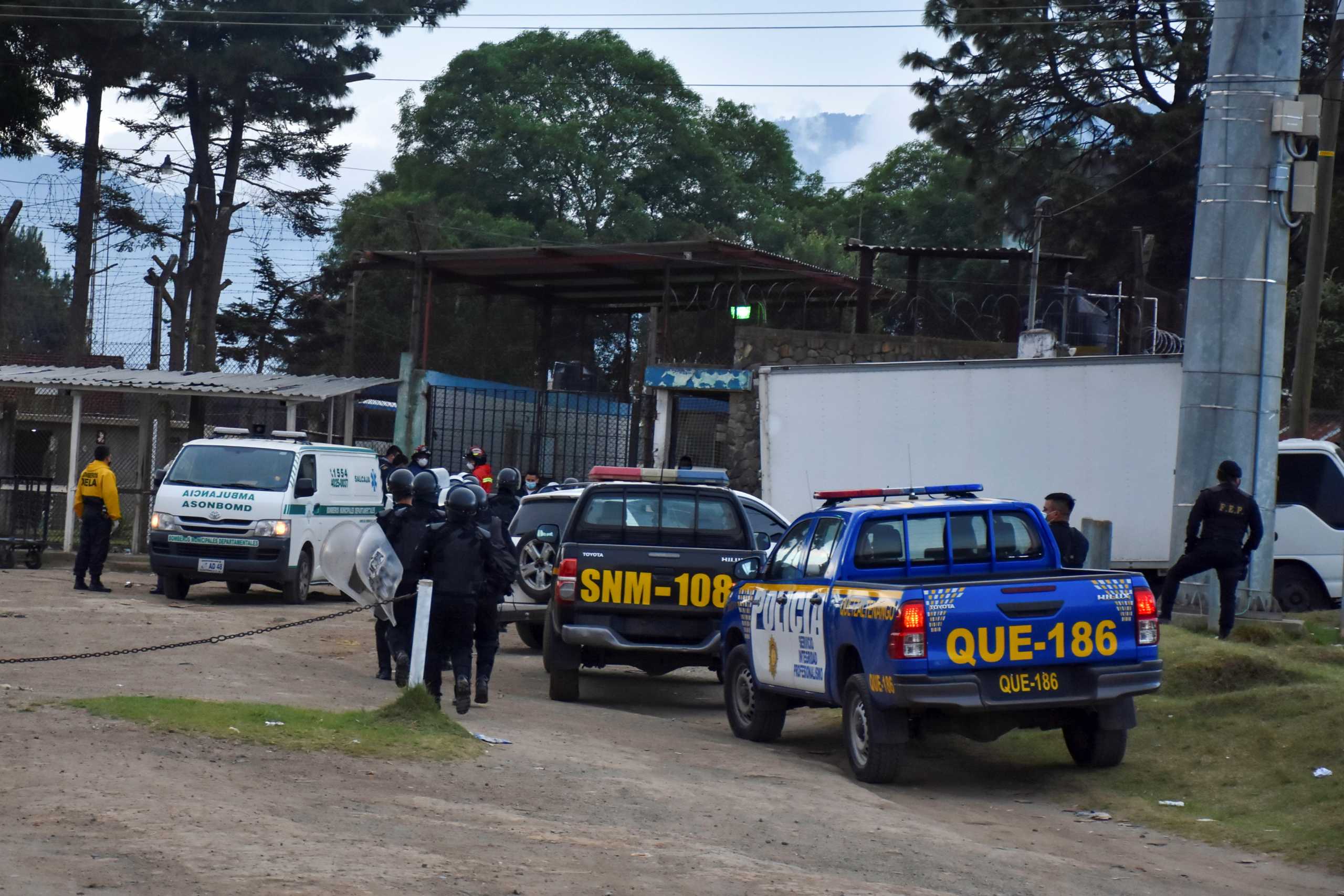Riot police officers enter a prison after a riot broke out at the facility, in the municipality of Cantel, in Quetzaltenango, Guatemala May 19, 2021. REUTERS