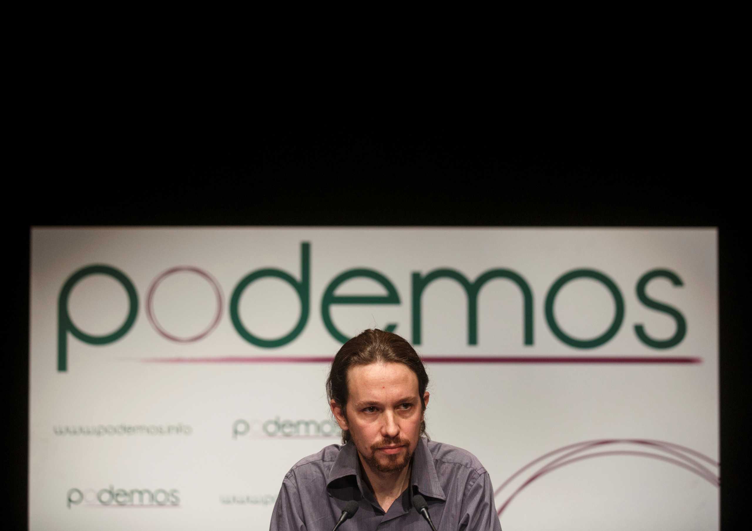 FILE PHOTO: Pablo Iglesias, head of leftist group "Podemos", or "We Can", delivers a speech during the presentation of the party in Madrid January 17, 2014.  REUTERS
