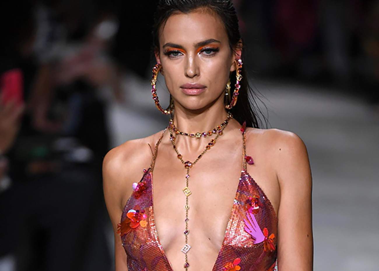 epa07857455 Russian model Irina Shayk presents a creation by Versace during the Milan Fashion Week, in Milan, Italy, 20 September 2019. Spring-Summer 2020 women's collections are presented at the Milano Moda Donna from 17 to 23 September.  EPA