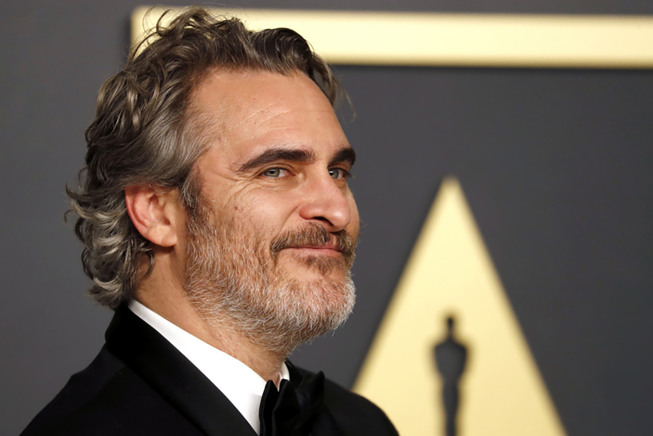 epa08760963 YEARENDER 2020 
PERSONALITIES

Joaquin Phoenix poses in the press room with the Oscar for Best Actor for his performance in 'Joker' during the 92nd annual Academy Awards ceremony at the Dolby Theatre in Hollywood, California, USA, 09 February 2020. After winning a BAFTA, a Golden Globe and a SAG award for his performance, the Joker star also received an Academy Award, becoming the second person to win an Oscar for portraying the Batman villain, after Heath Ledger.  EPA