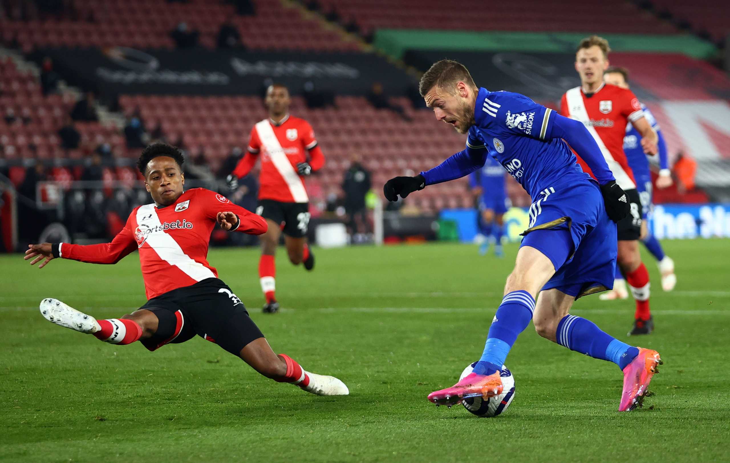 Soccer Football - Premier League - Southampton v Leicester City - St Mary's Stadium, Southampton, Britain - April 30, 2021 Leicester City's Jamie Vardy in action with Southampton's Kyle Walker-Peters Pool via REUTERS