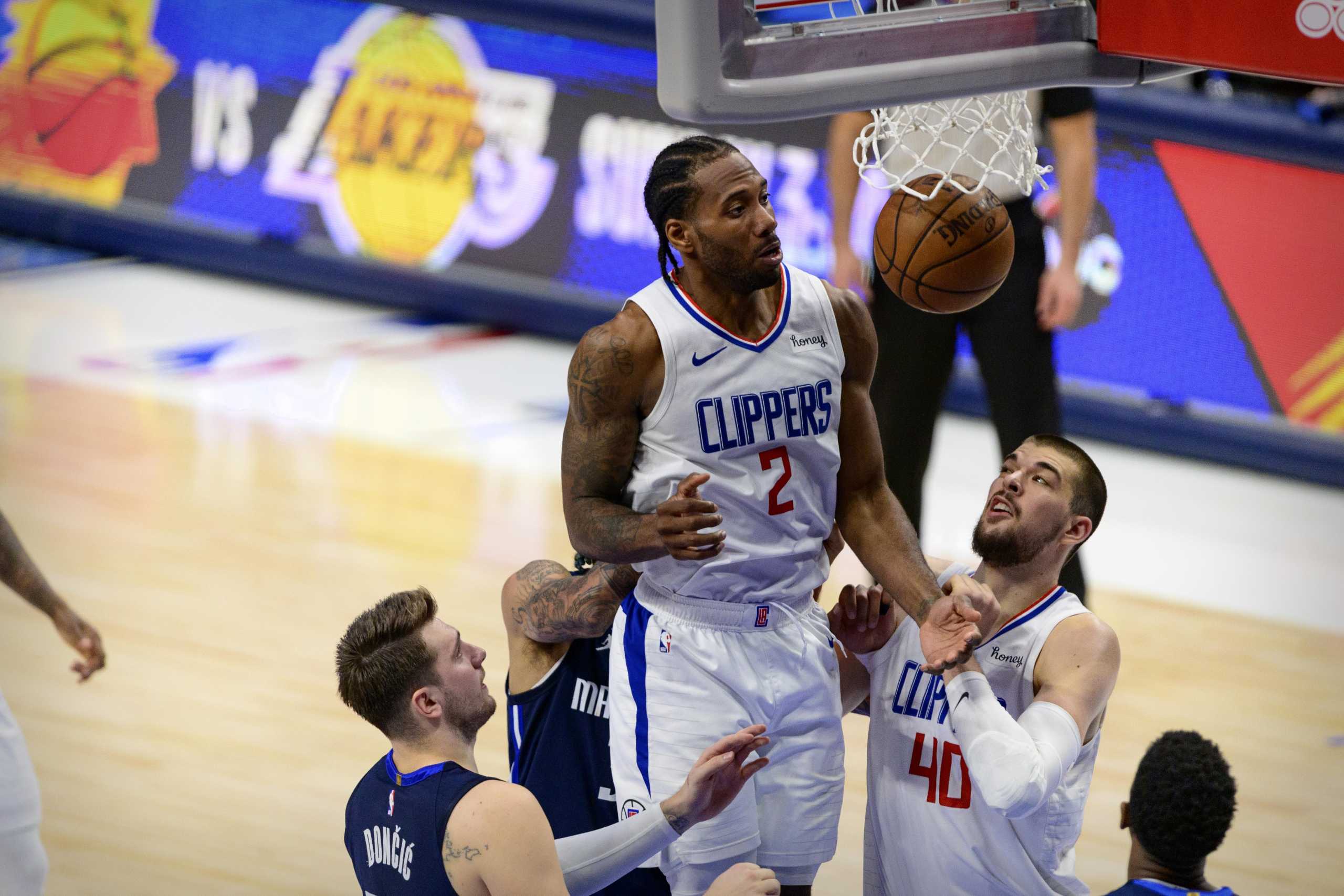 May 28, 2021; Dallas, Texas, USA; LA Clippers forward Kawhi Leonard (2) watches his shot go in against the Dallas Mavericks during the second half in game three in the first round of the 2021 NBA Playoffs at American Airlines Center. Mandatory Credit: Jerome Miron-USA TODAY Sports