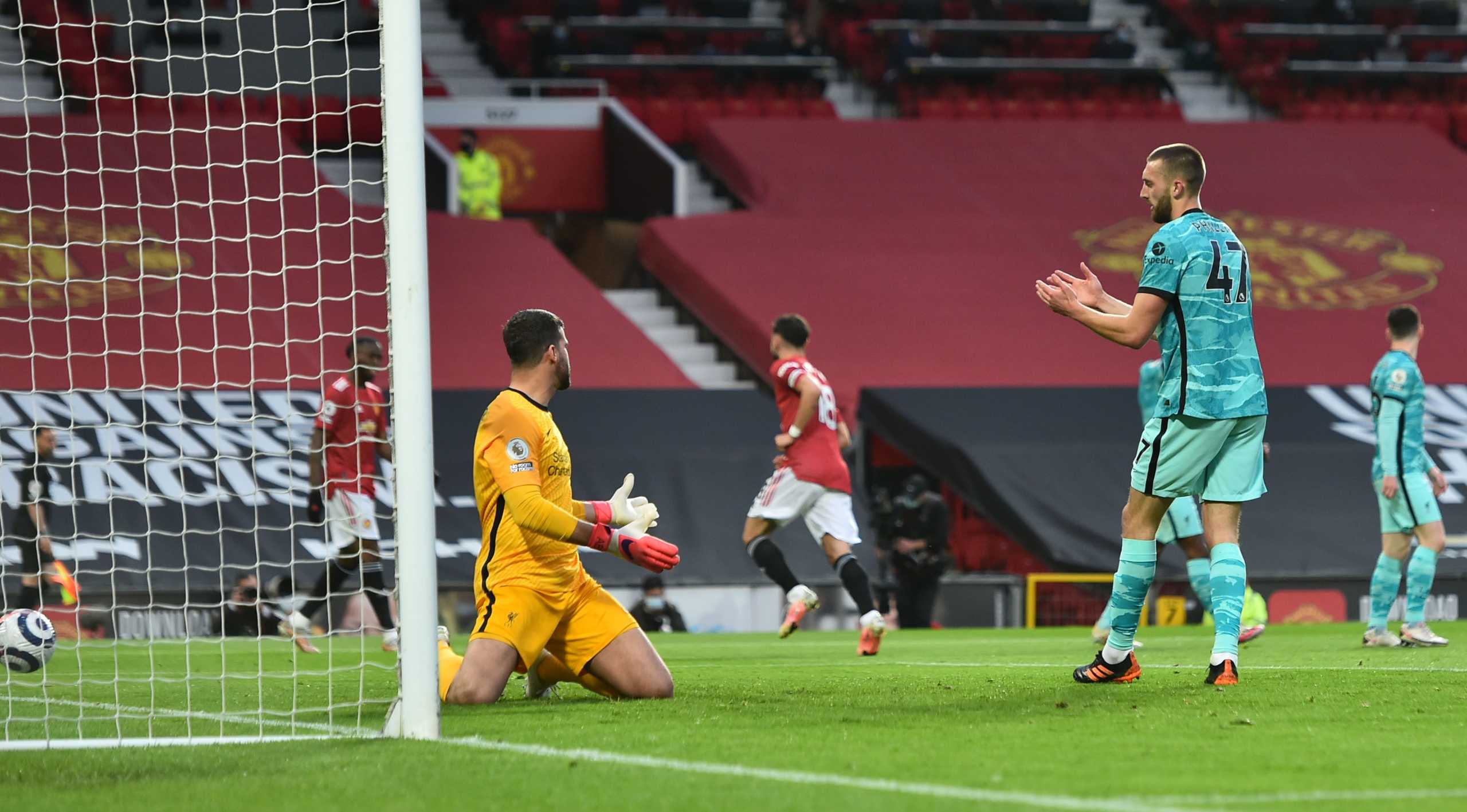 Soccer Football - Premier League - Manchester United v Liverpool - Old Trafford, Manchester, Britain - May 13, 2021 Liverpool's Nathaniel Phillips reacts after scoring an own goal and Manchester Uniteds first Pool via REUTERS